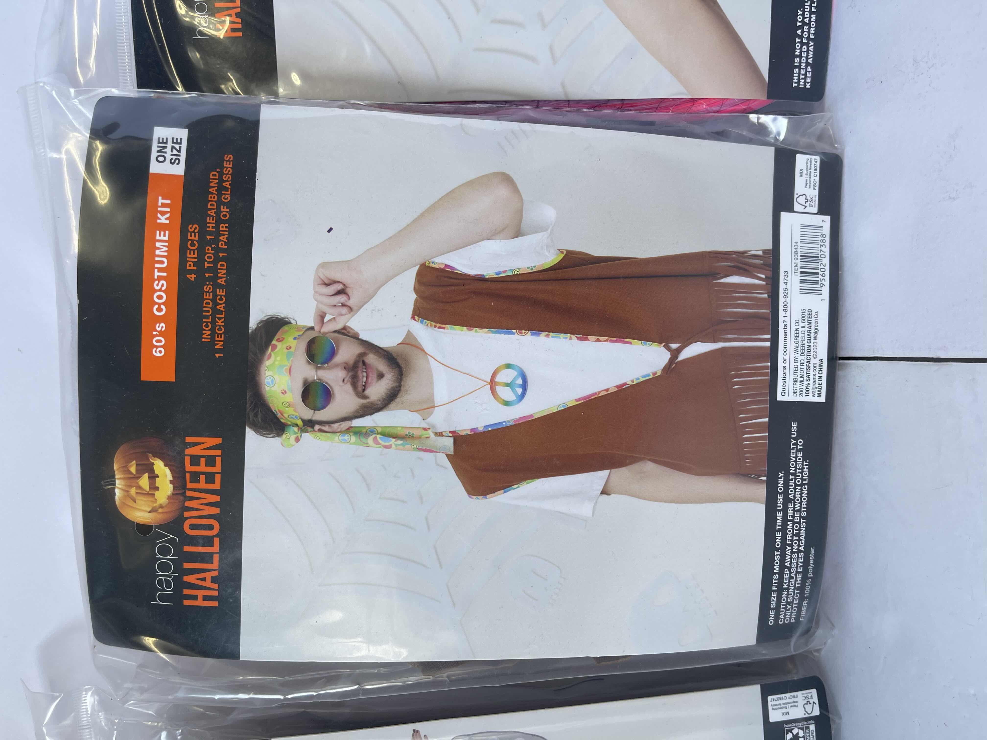 Photo 1 of HALLOWEEN ASSORTED COSTUMES - RAVEN WINGS, 60’S COSTUMES KIT & MULTI COLORED BOB WIG - ONE SIZE FITS MOST