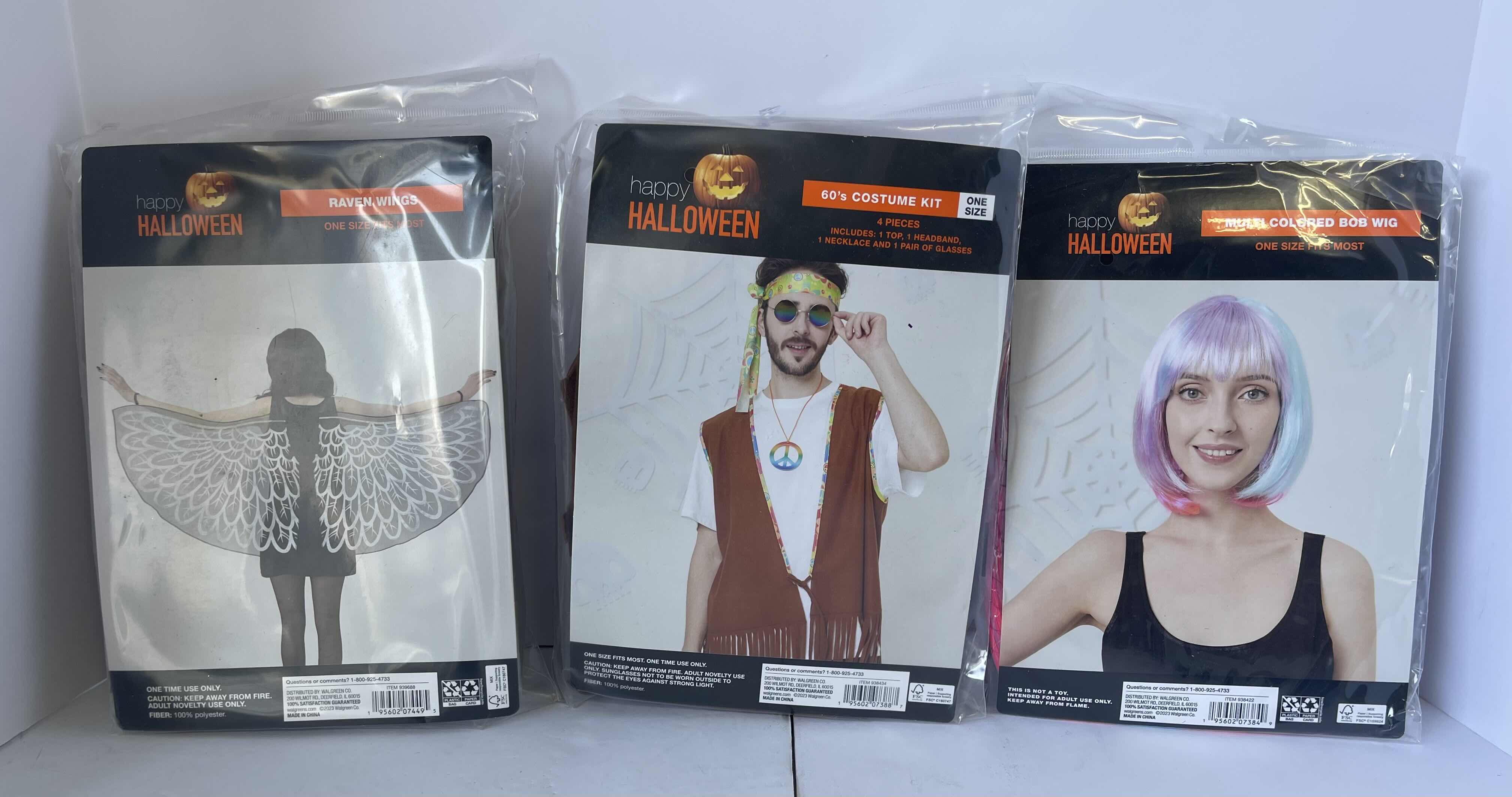 Photo 1 of HALLOWEEN ASSORTED COSTUMES - RAVEN WINGS, 60’S COSTUMES KIT & MULTI COLORED BOB WIG - ONE SIZE FITS MOST