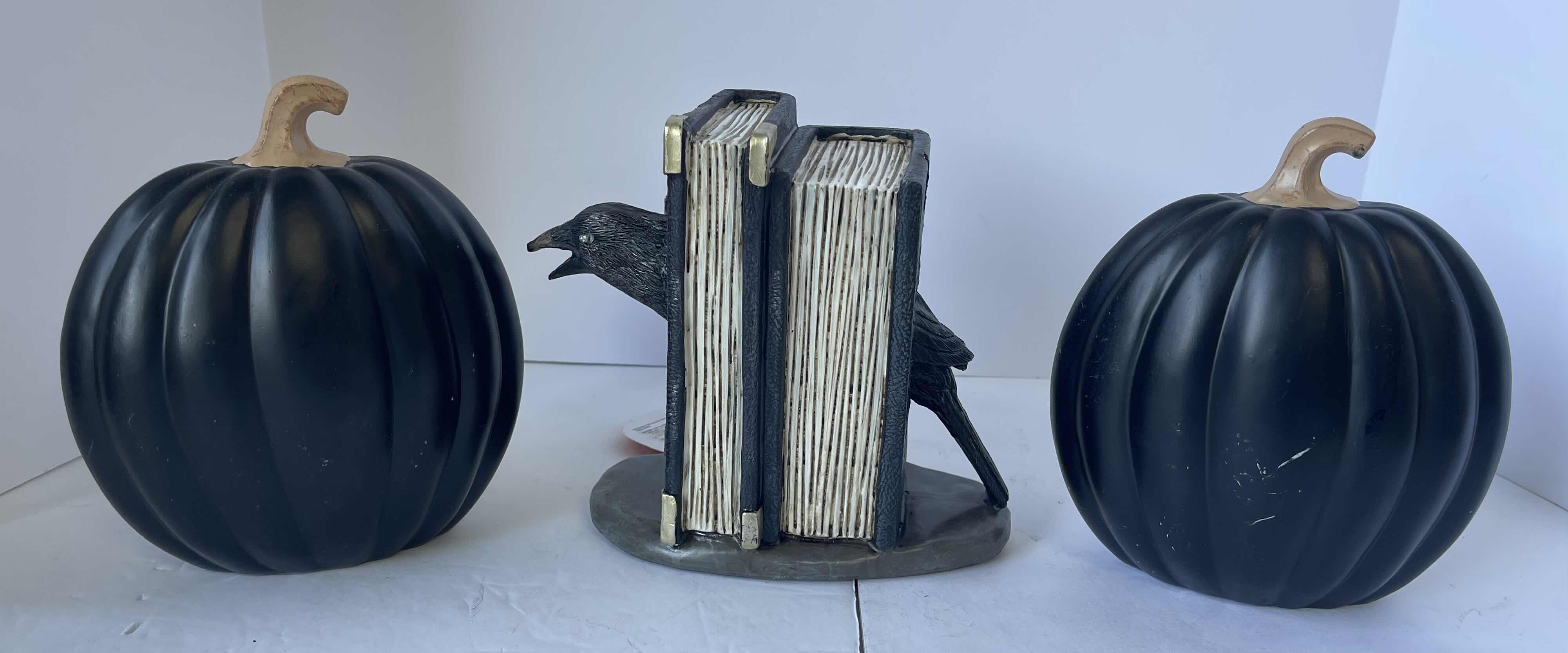 Photo 1 of HAPPY HALLOWEEN 7” TABLE TOP RESIN HOME DECOR - HOCUS POCUS PUMPKINS (3) & LIGHT UP BLACK BIRD IN POTION BOOK (1) NEW