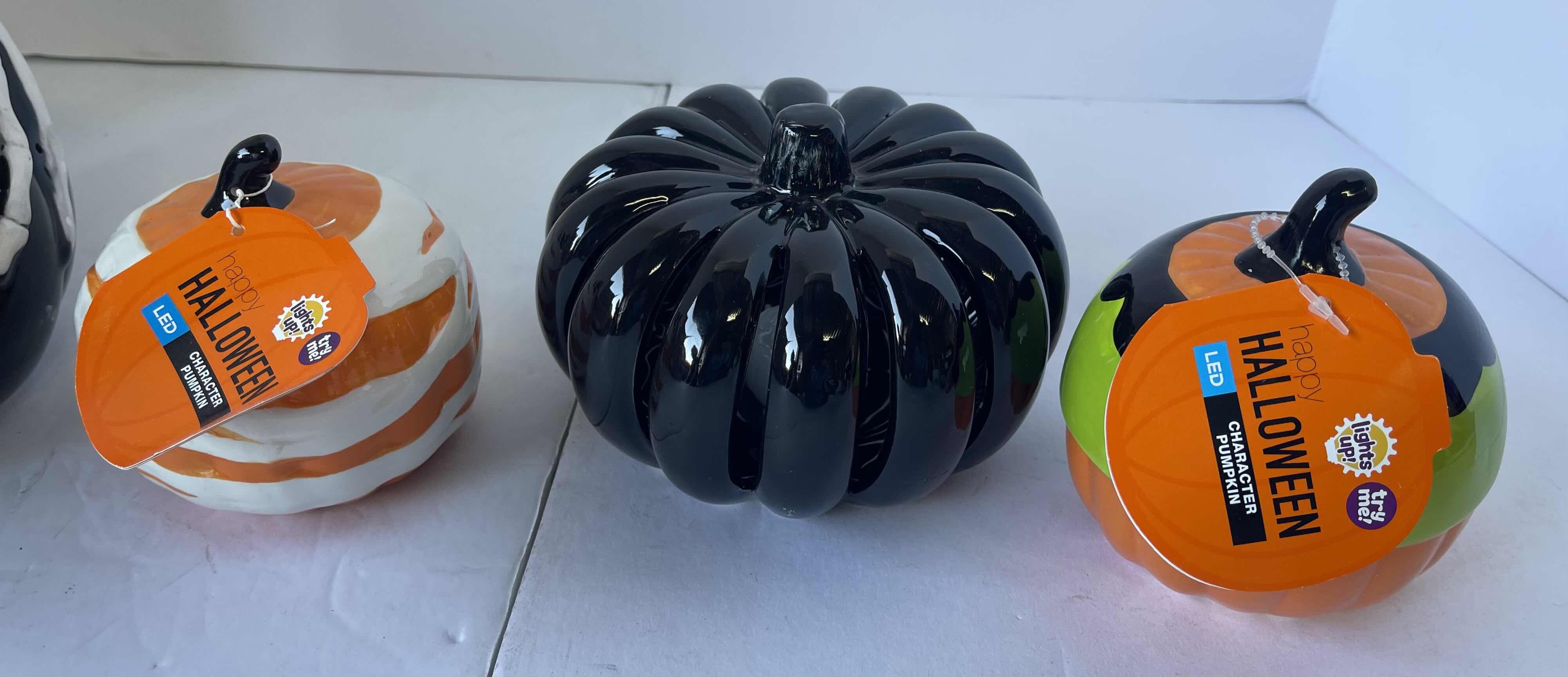 Photo 1 of CERAMIC HALLOWEEN PUMPKINS (4) NEW - TALLEST H6"
