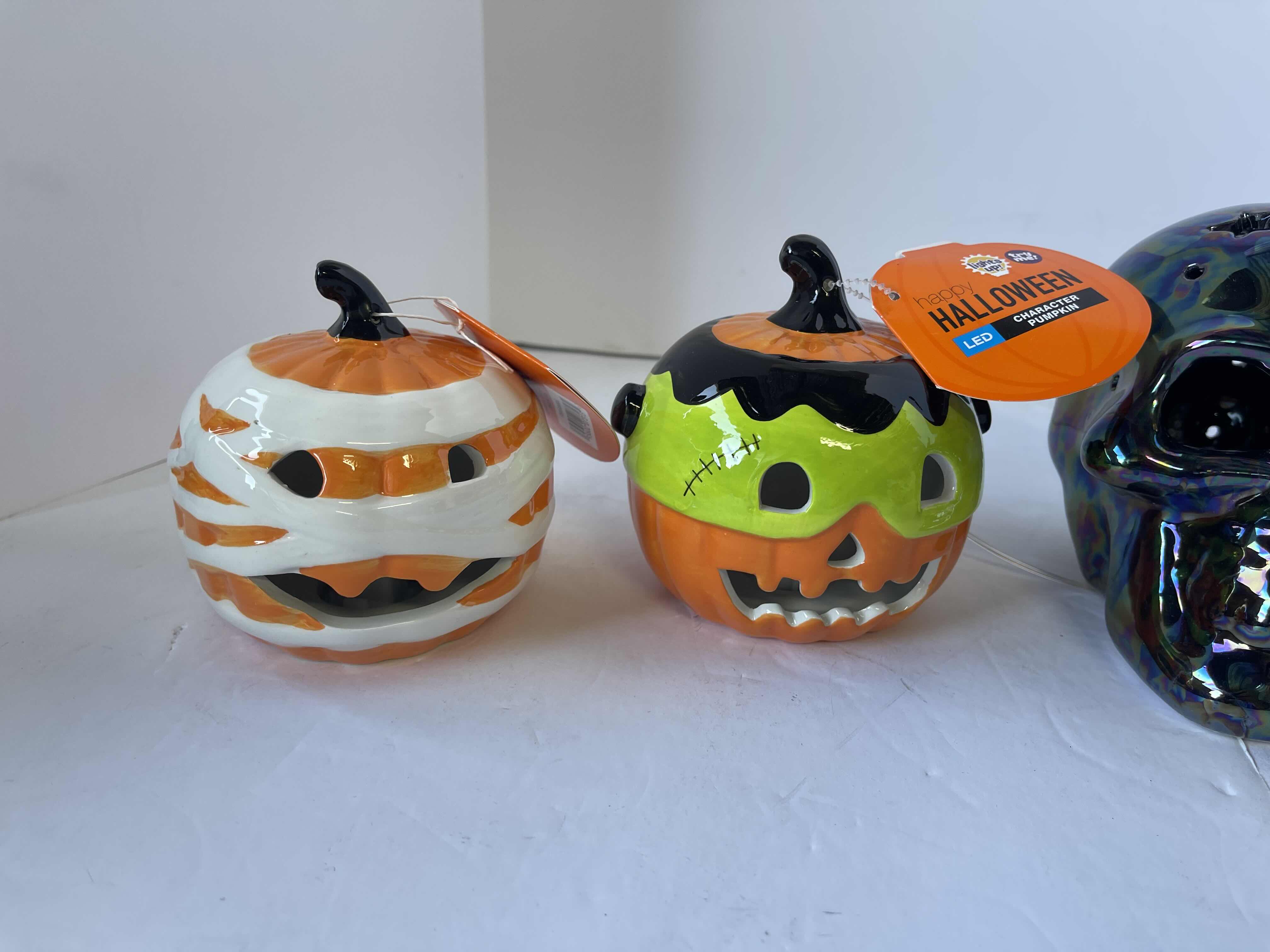 Photo 1 of CERAMIC HALLOWEEN HOME DECOR PUMPKINS (3) & SKULL
