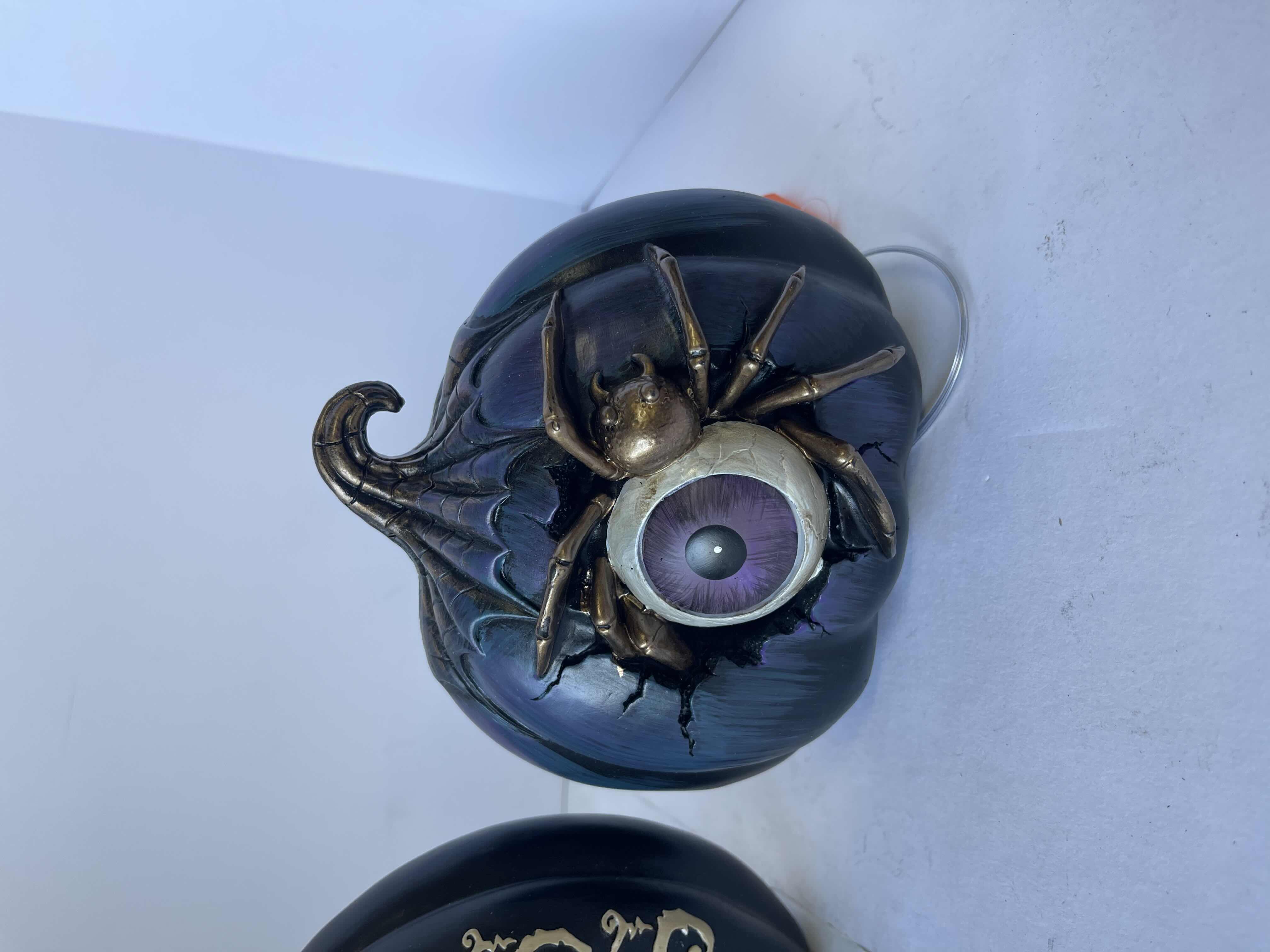 Photo 1 of RESIN HALLOWEEN PUMPKINS - LIGHT UP SPIDER EYEBALL (2) & HOCUS POCUS NEW