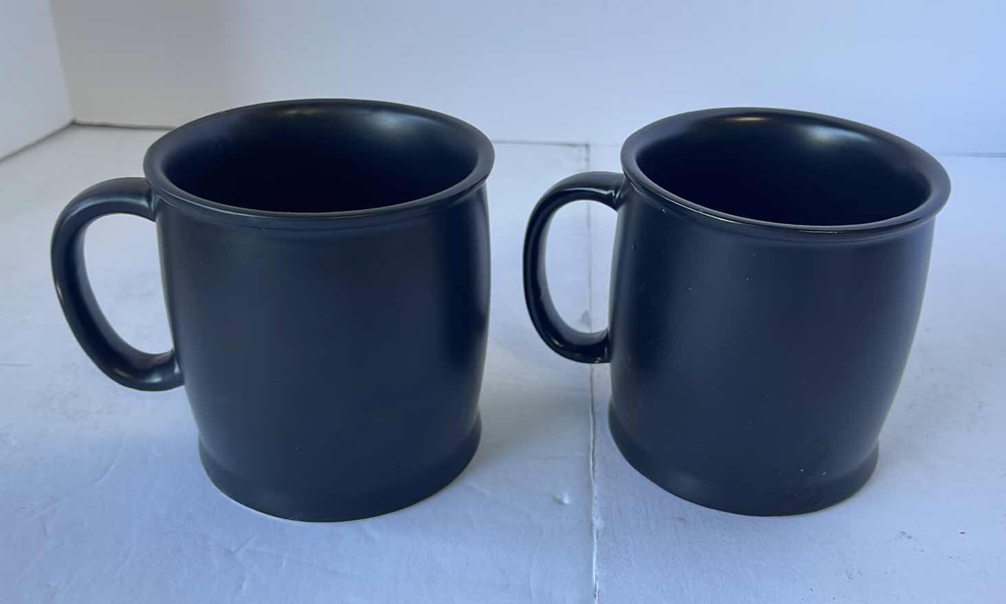 Photo 1 of MODERN EXPRESSIONS BLACK CERMIC 17.5 OZ. MUGS (2)