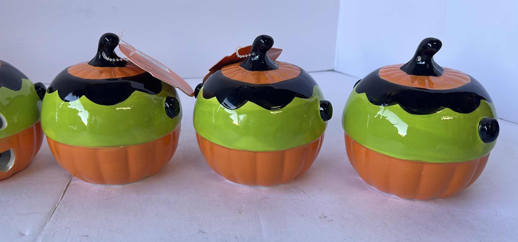 Photo 1 of HAPPY HALLOWEEN 4” MINI CERAMIC LIGHT UP PUMPKINS (6)