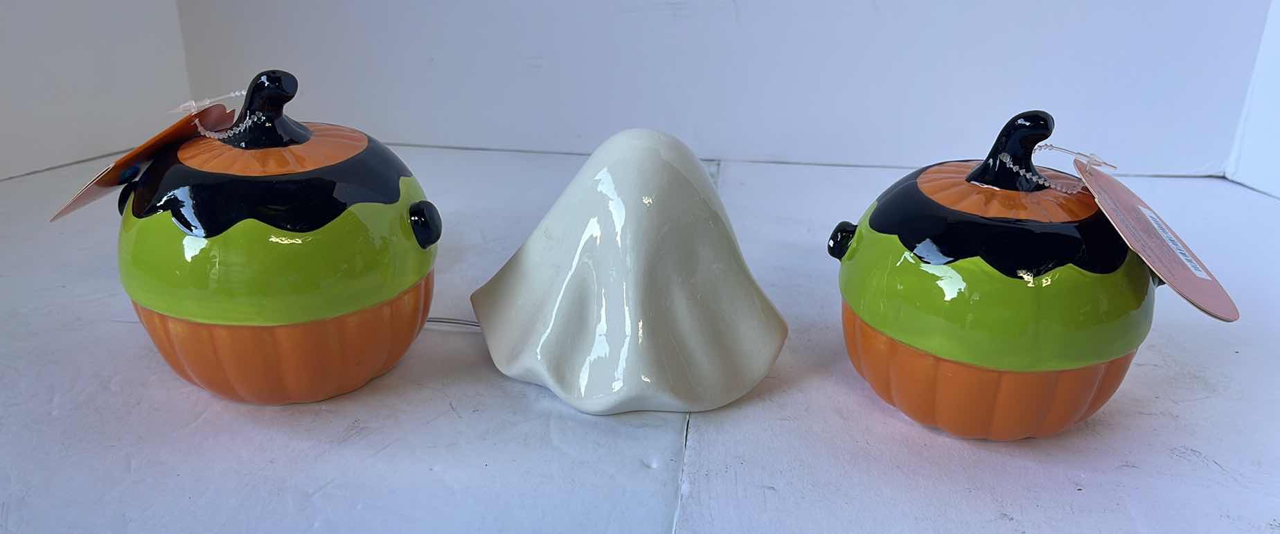 Photo 1 of HAPPY HALLOWEEN 4” MINI CERAMIC LIGHT UP PUMPKINS (2) & CERAMIC GHOST