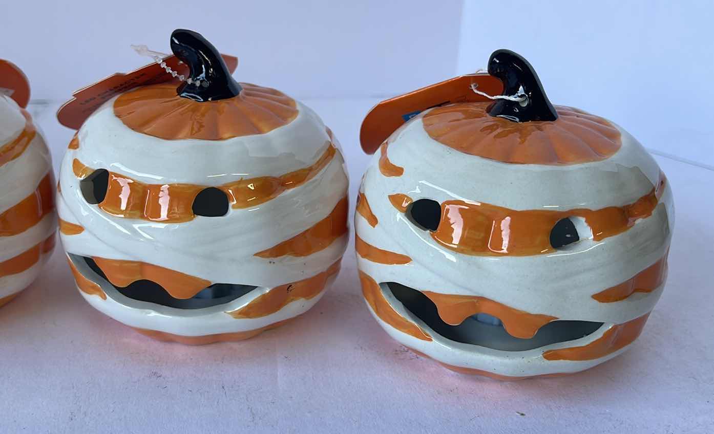 Photo 1 of HAPPY HALLOWEEN 4” MINI CERAMIC LIGHT UP PUMPKINS (5)