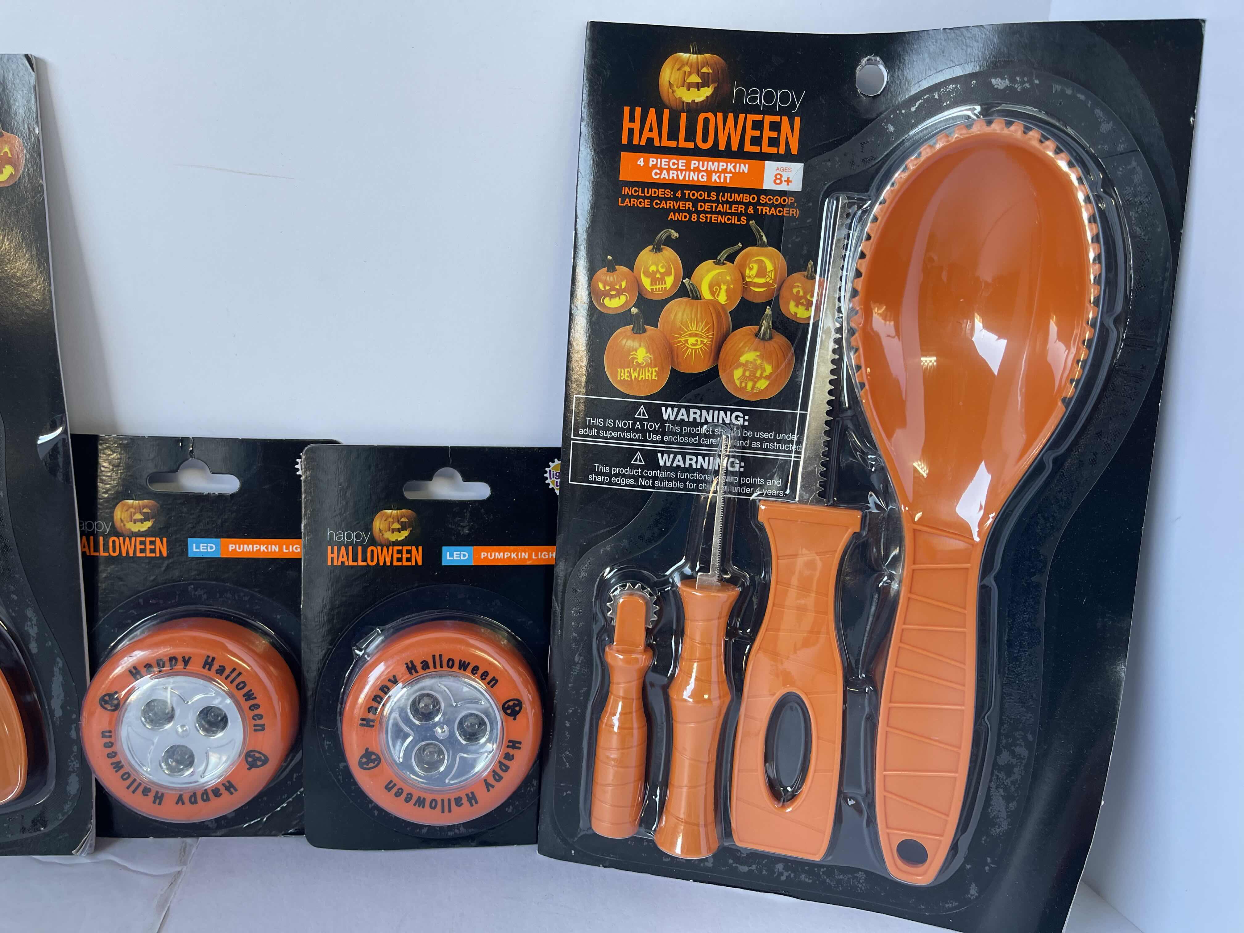 Photo 1 of PUMPKIN CARVING KITS (2), JUMBO CARVING SPOON & LED PUMPKIN LIGHT (2)