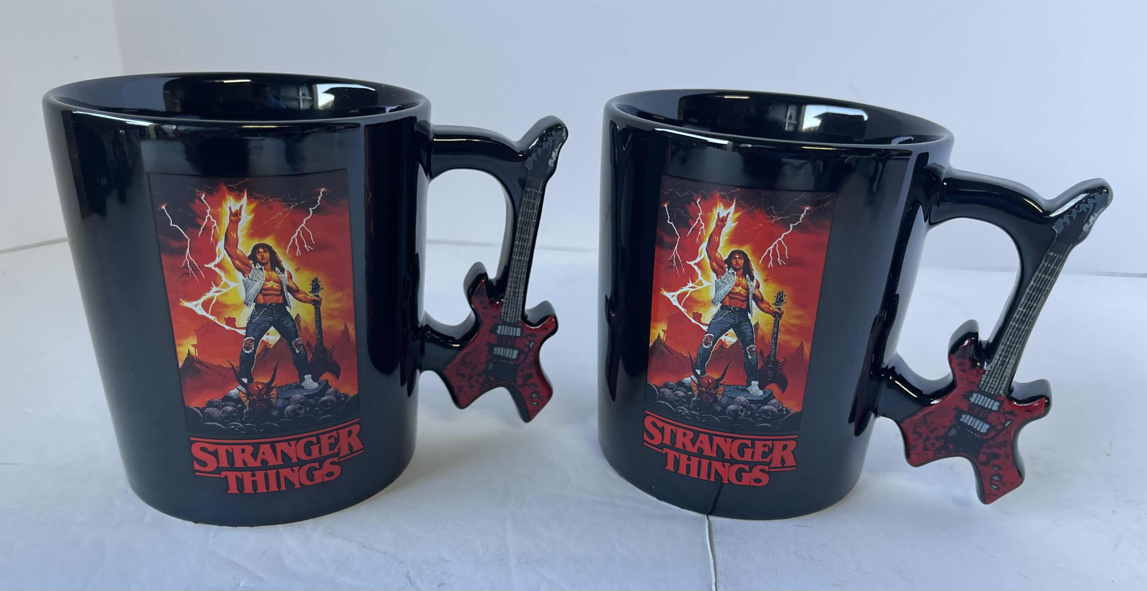 Photo 1 of STRANGER THINGS COLLECTOR CERAMIC MUGS 17.5 OZ (2)
