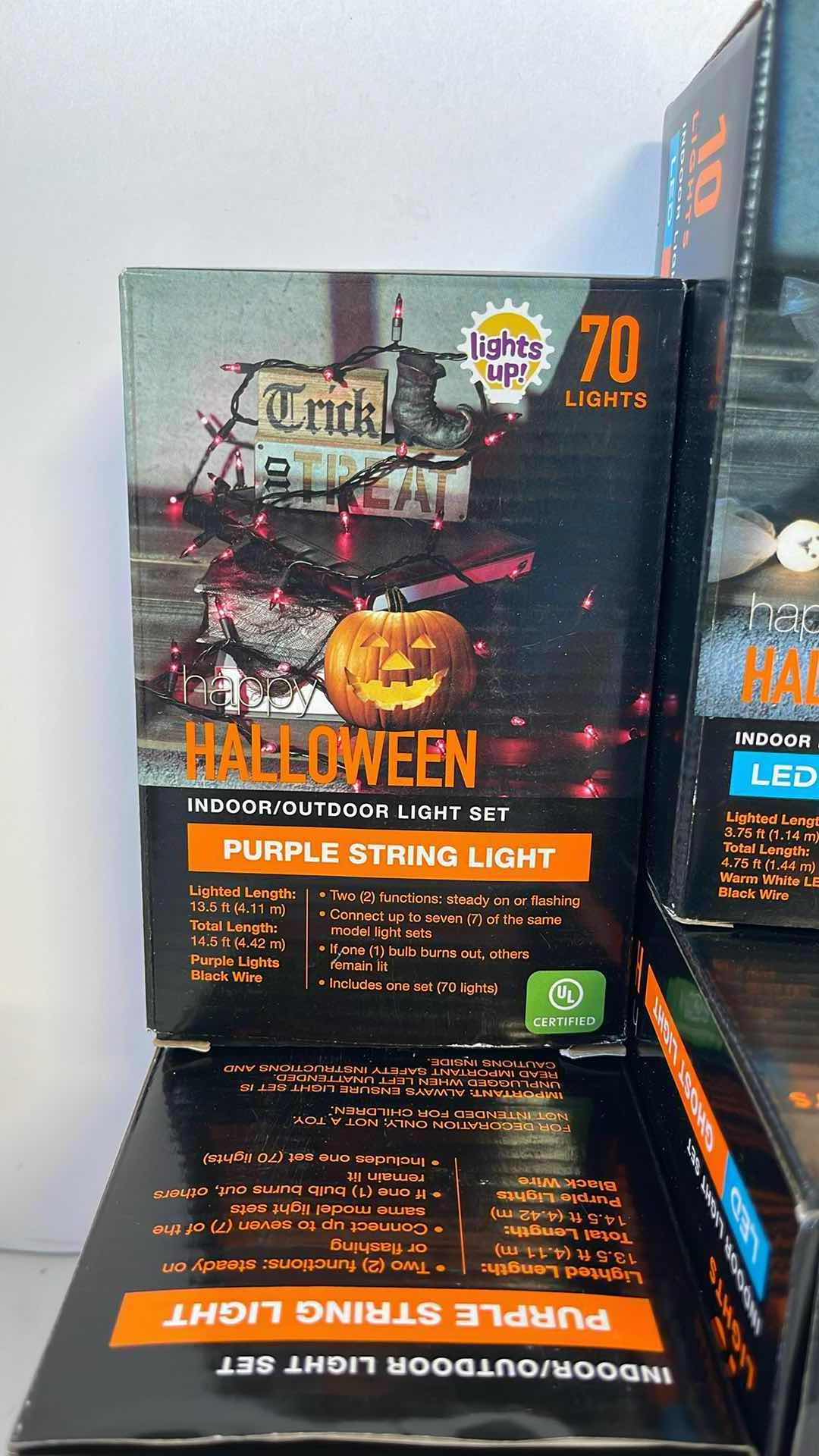 Photo 1 of HALLOWEEN LIGHT SETS (9 TOTAL) - PURPLE STRING BOX (3), ORANGE STRING BOX (3) & LED INDOOR GHOST LIGHT BOX (3)