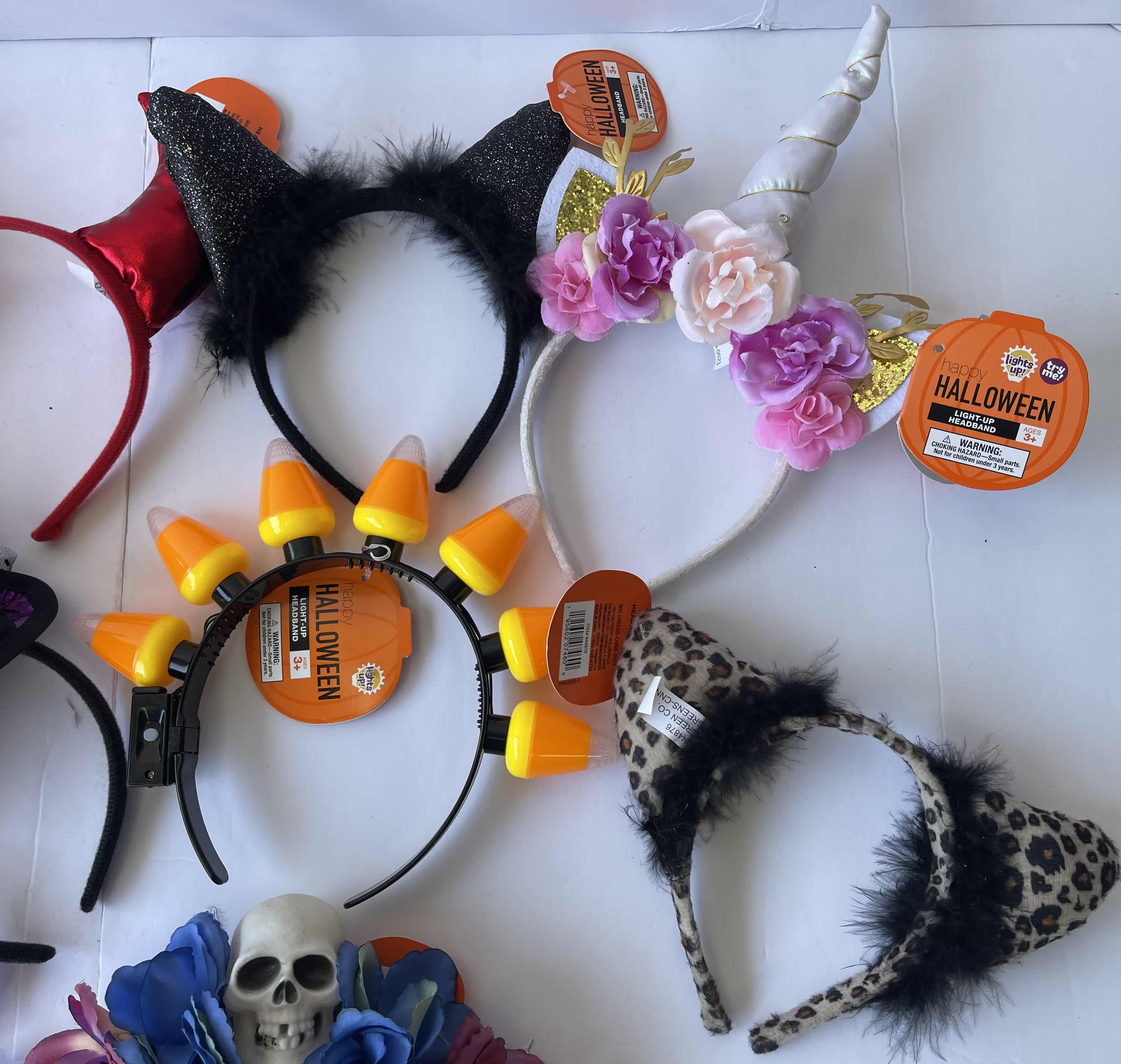 Photo 1 of HALLOWEEN LIGHT-UP AND NON LIGHT-UP HEADBAND ASSORTMENT (10)
