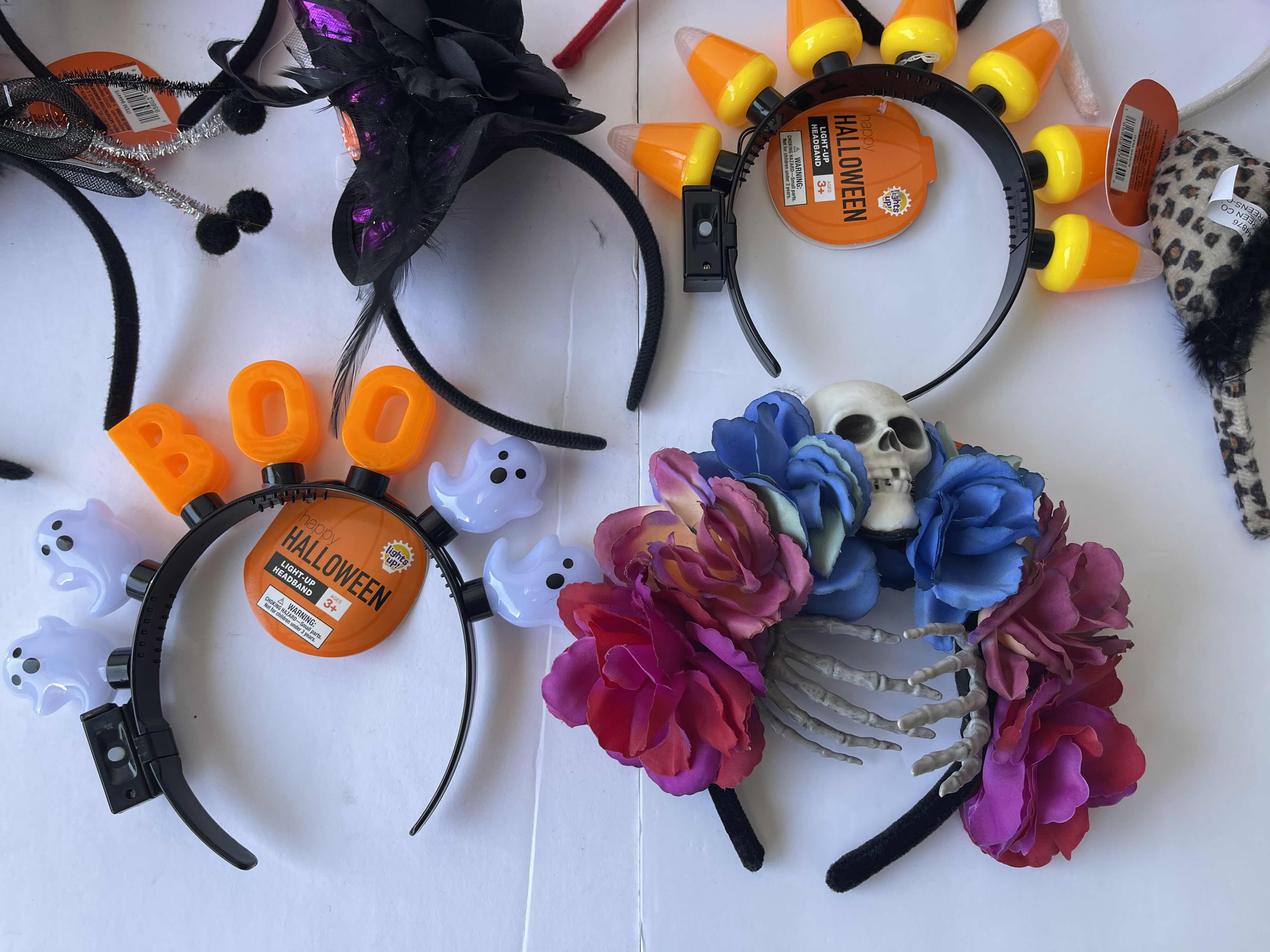 Photo 1 of HALLOWEEN LIGHT-UP AND NON LIGHT-UP HEADBAND ASSORTMENT (10)