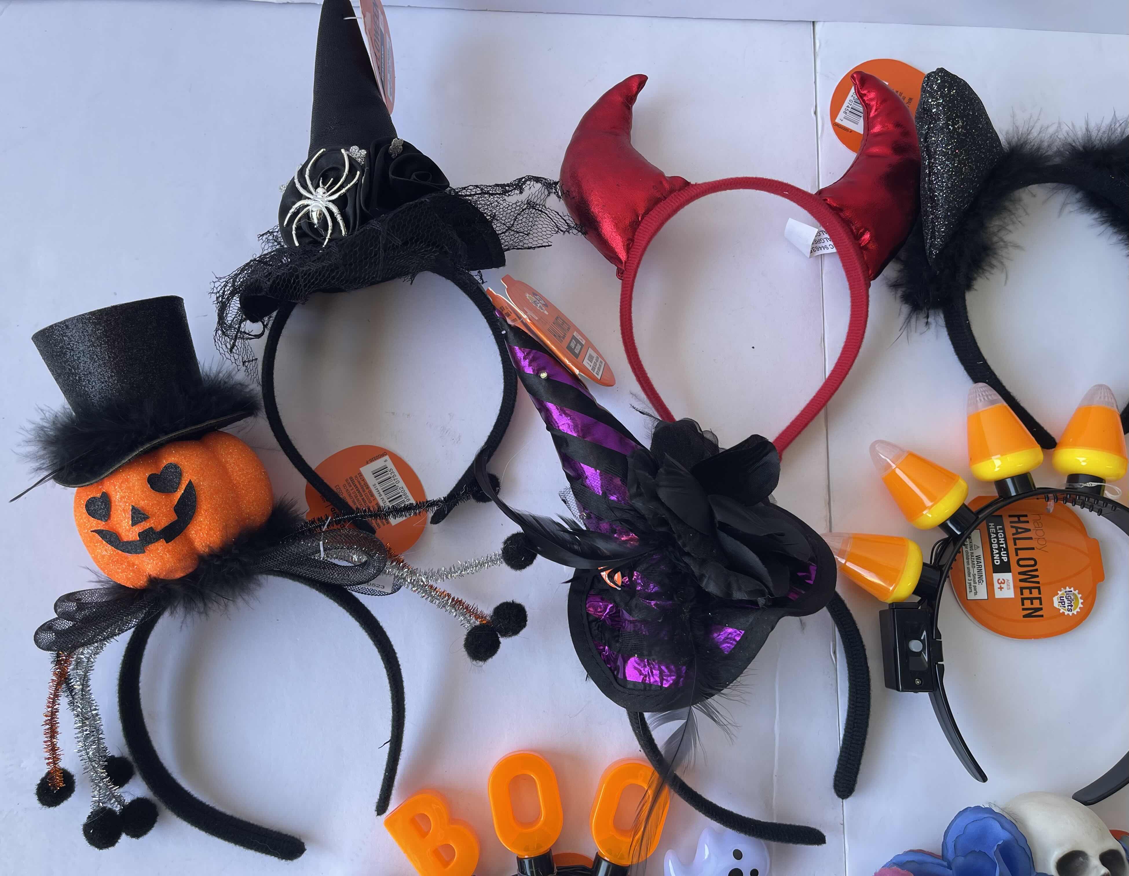 Photo 1 of HALLOWEEN LIGHT-UP AND NON LIGHT-UP HEADBAND ASSORTMENT (10)