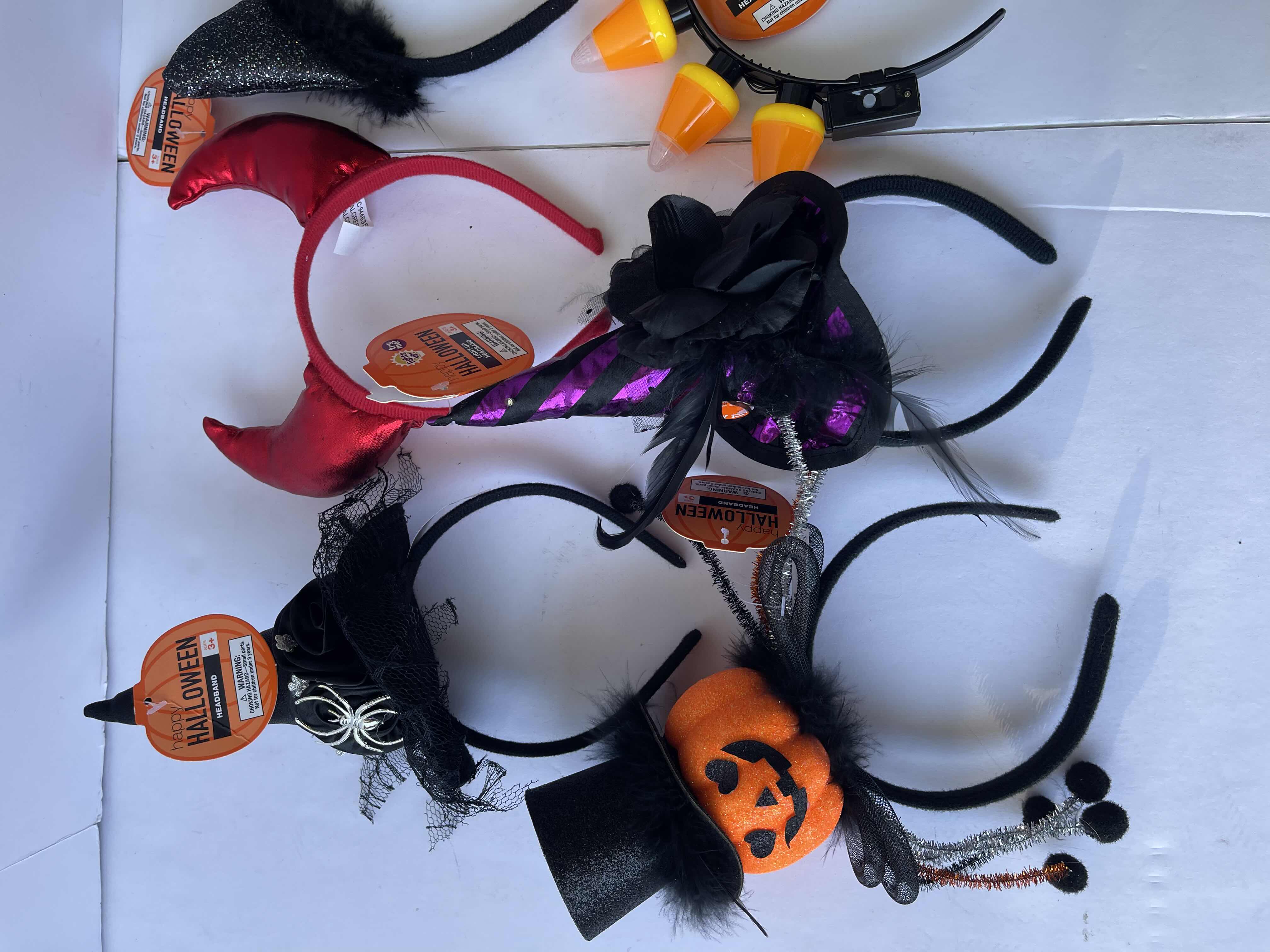 Photo 1 of HALLOWEEN LIGHT-UP AND NON LIGHT-UP HEADBAND ASSORTMENT (8)