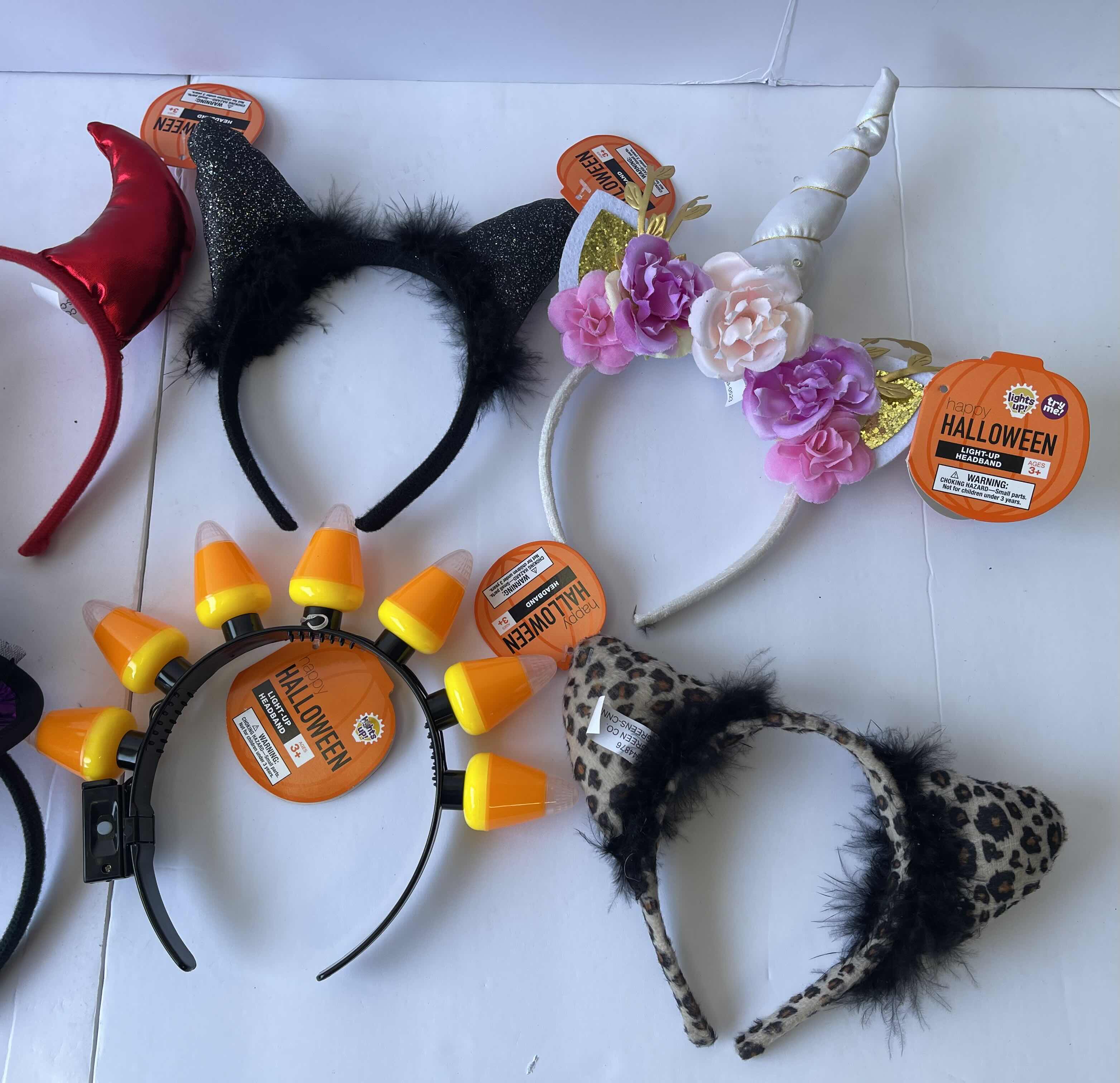 Photo 1 of HALLOWEEN LIGHT-UP AND NON LIGHT-UP HEADBAND ASSORTMENT (8)