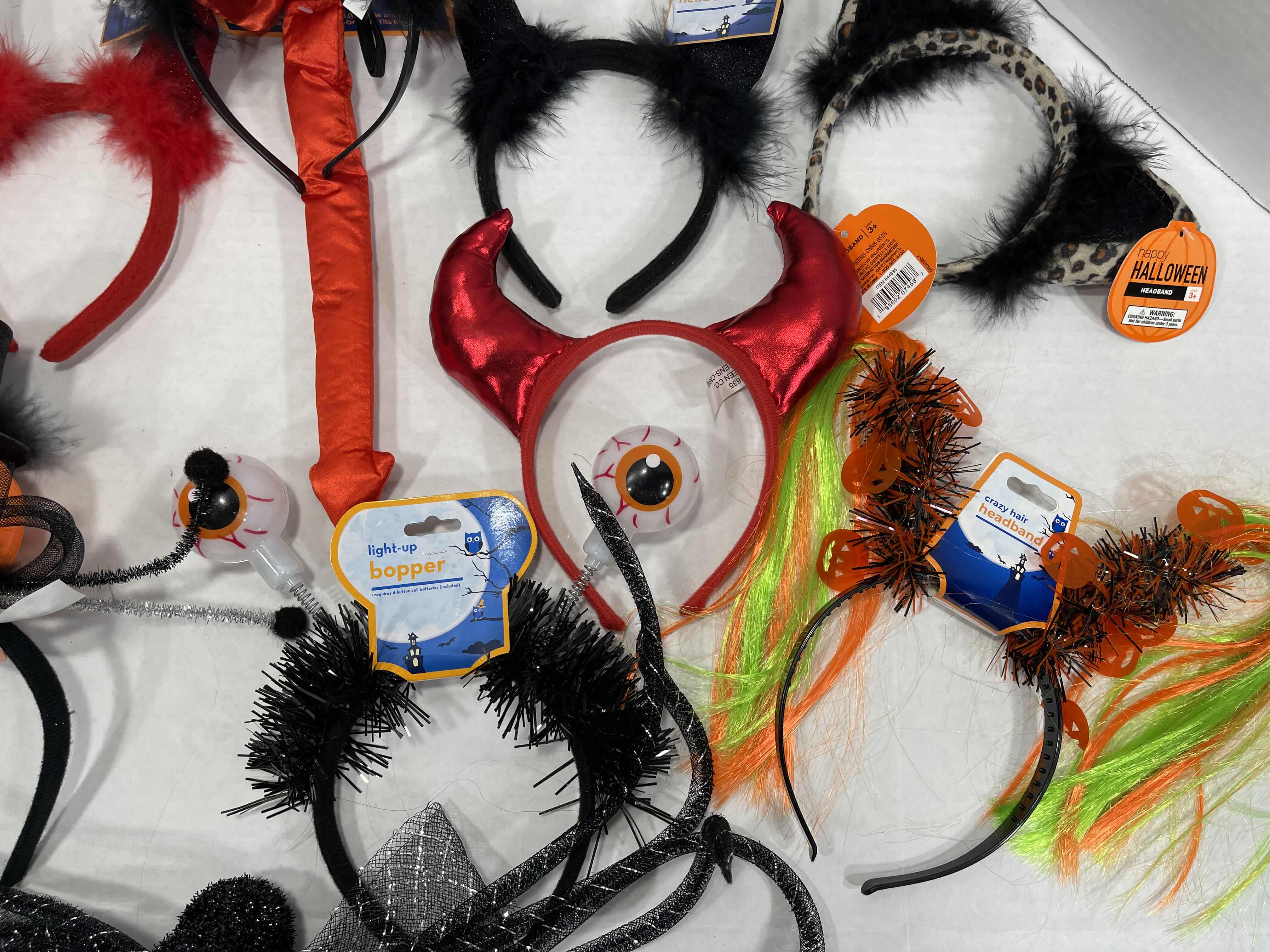Photo 1 of HALLOWEEN CRAZY HEADBANDS LOT OF (11) INCLUDING TWO LIGHT-UP HEADBANDS