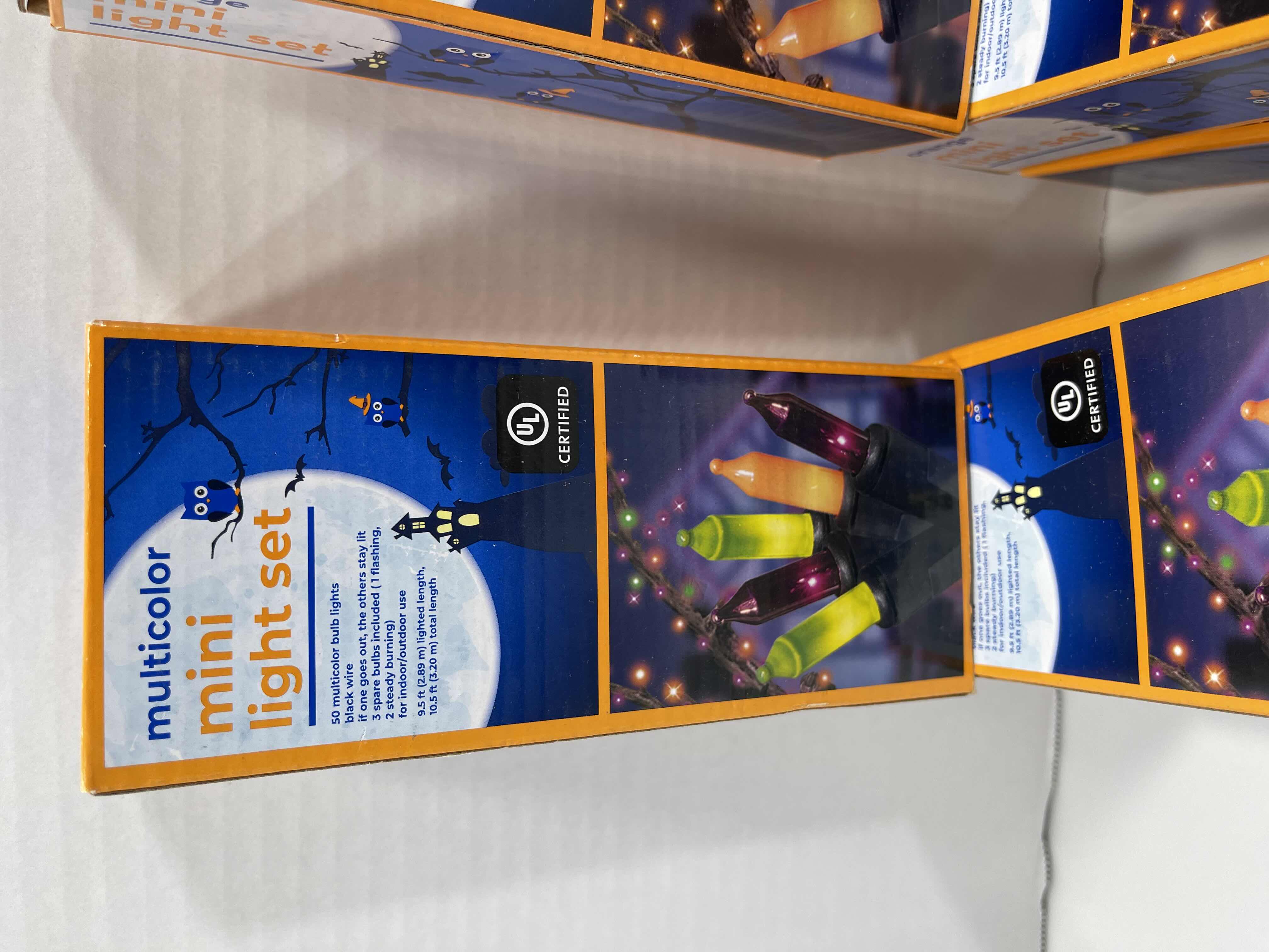 Photo 1 of MINI LIGHT INDOOR/OUTDOOR BOX SETS (9) - MULTICOLOR (3), ORANGE (3) & PURPLE (3) $70