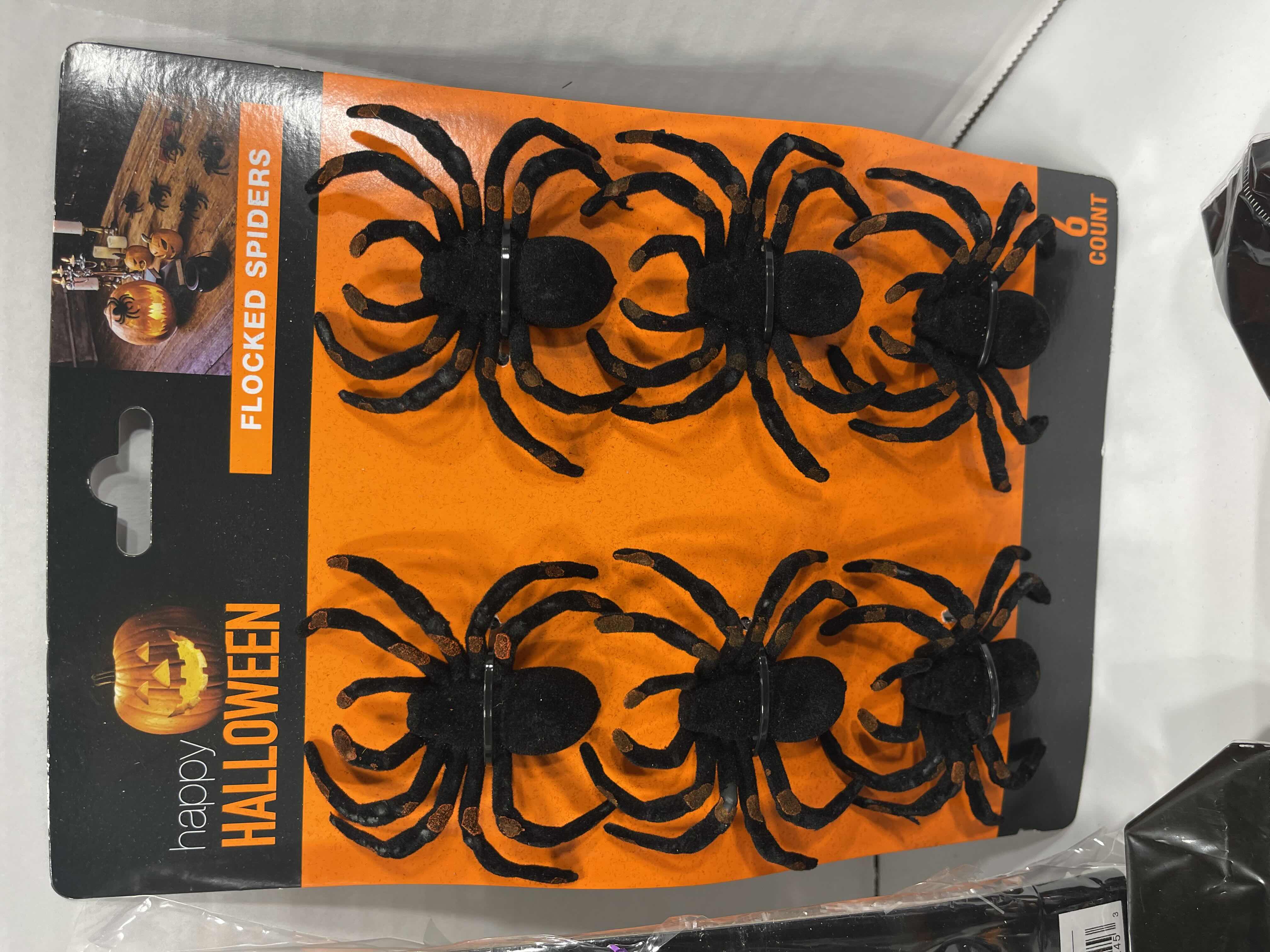 Photo 1 of SPIDER WEB LOT (10 BAGS), TINSEL SPIDER WEB 72” X 72” & FLOCKED SPIDERS (12 COUNT)