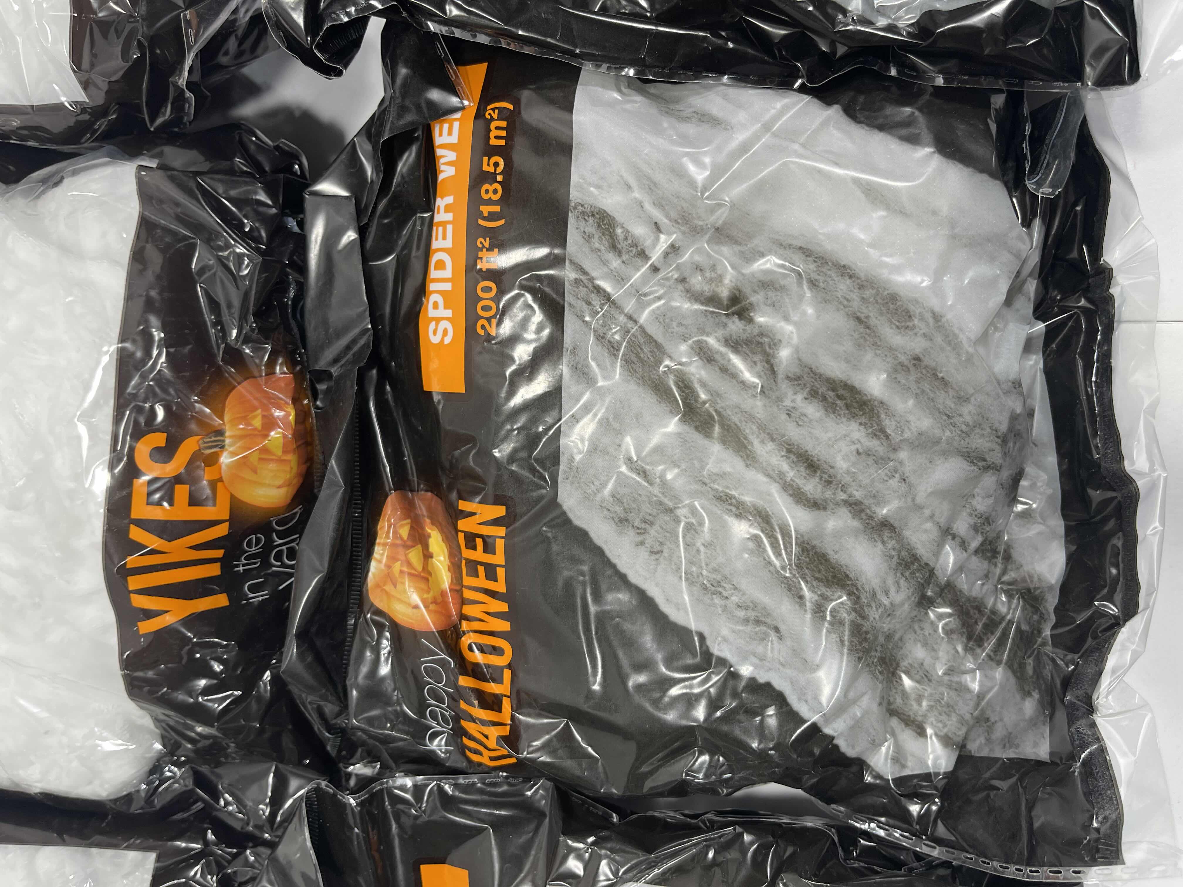 Photo 1 of SPIDER WEB LOT (10 BAGS), TINSEL SPIDER WEB 72” X 72” & FLOCKED SPIDERS (12 COUNT)