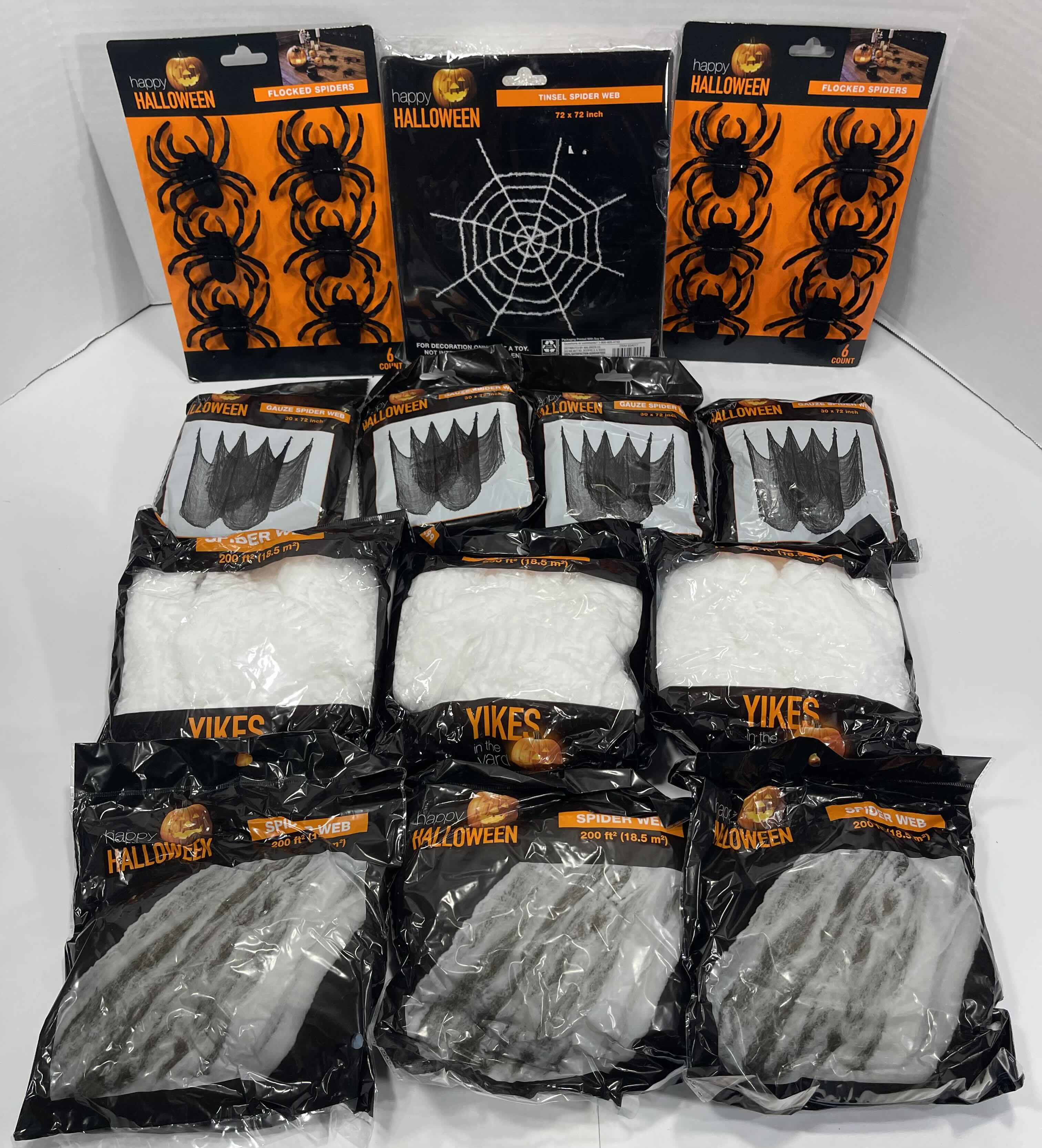 Photo 1 of SPIDER WEB LOT (10 BAGS), TINSEL SPIDER WEB 72” X 72” & FLOCKED SPIDERS (12 COUNT)