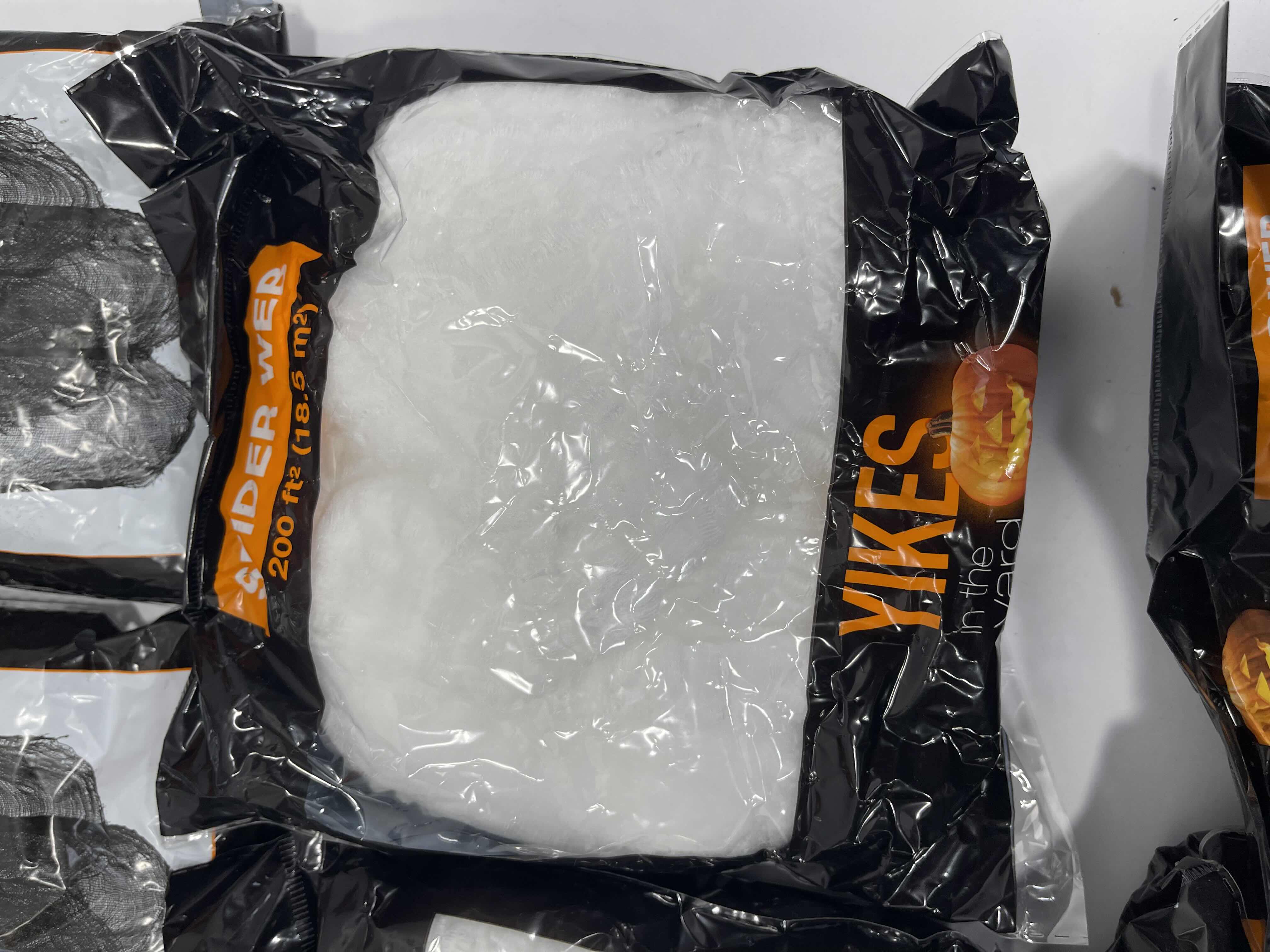 Photo 1 of SPIDER WEB LOT (10 BAGS), TINSEL SPIDER WEB 72” X 72” & FLOCKED SPIDERS (12 COUNT)