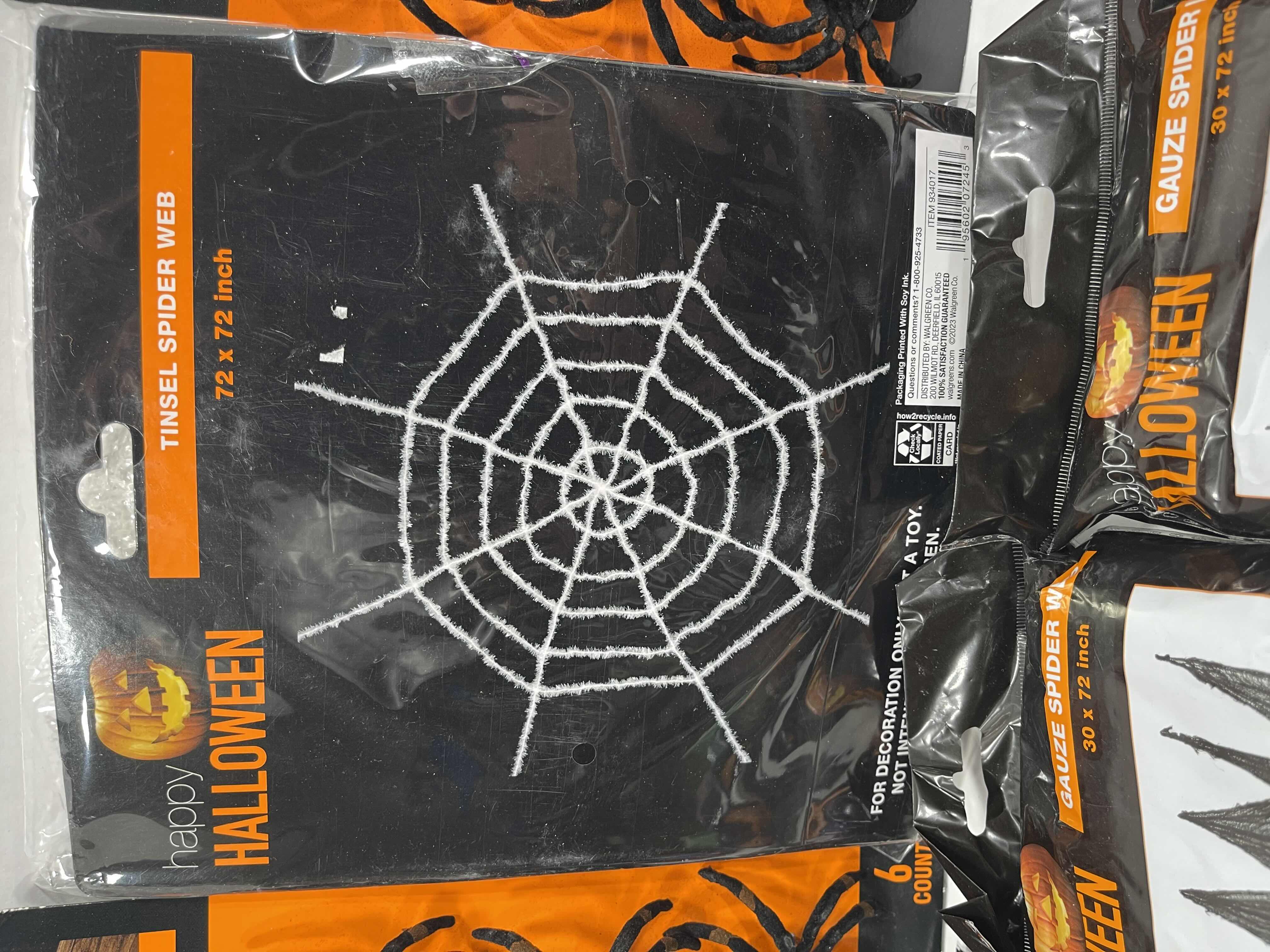 Photo 1 of SPIDER WEB LOT (10 BAGS), TINSEL SPIDER WEB 72” X 72” & FLOCKED SPIDERS (12 COUNT)