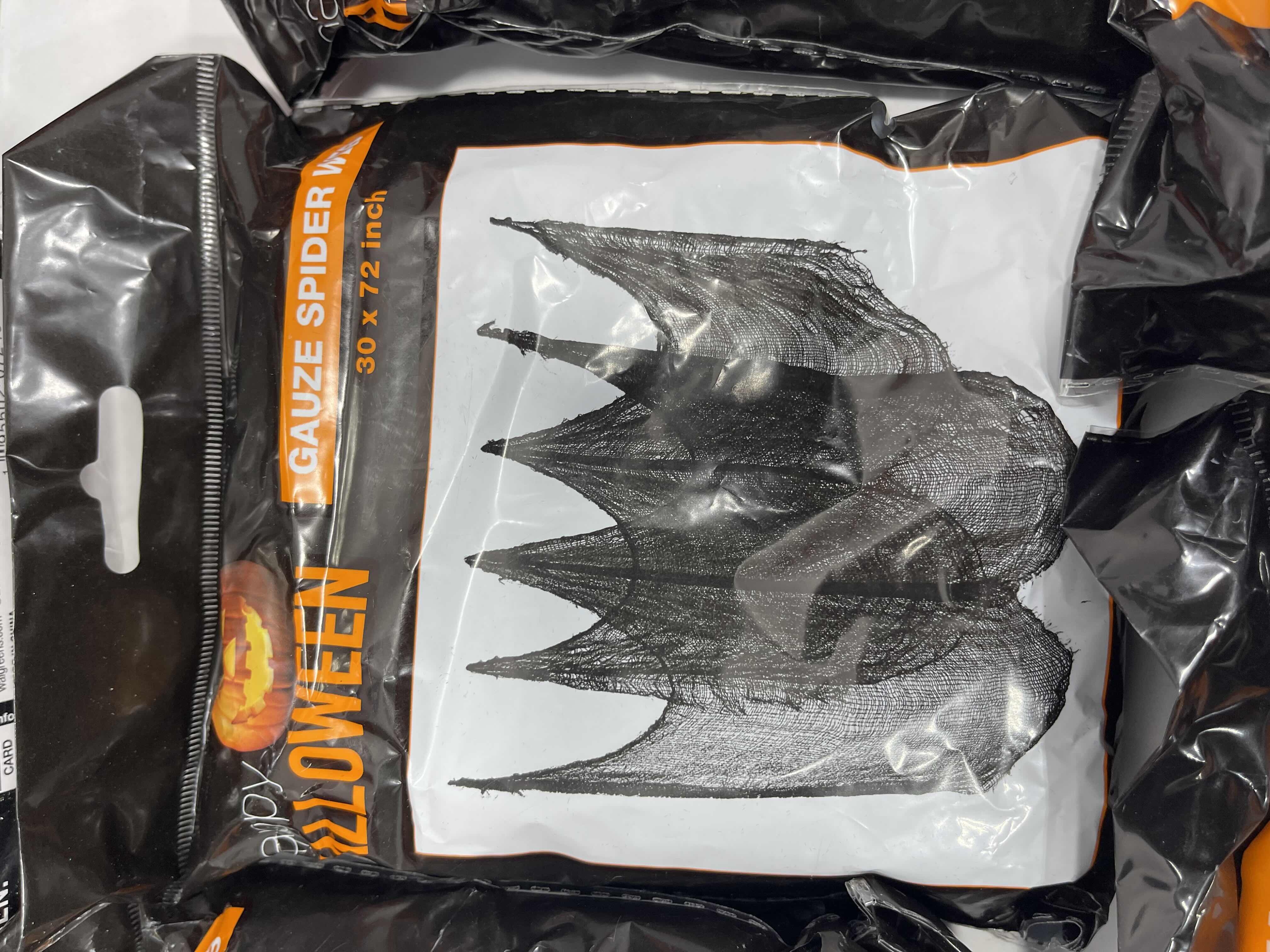 Photo 1 of SPIDER WEB LOT (10 BAGS), TINSEL SPIDER WEB 72” X 72” & FLOCKED SPIDERS (12 COUNT)