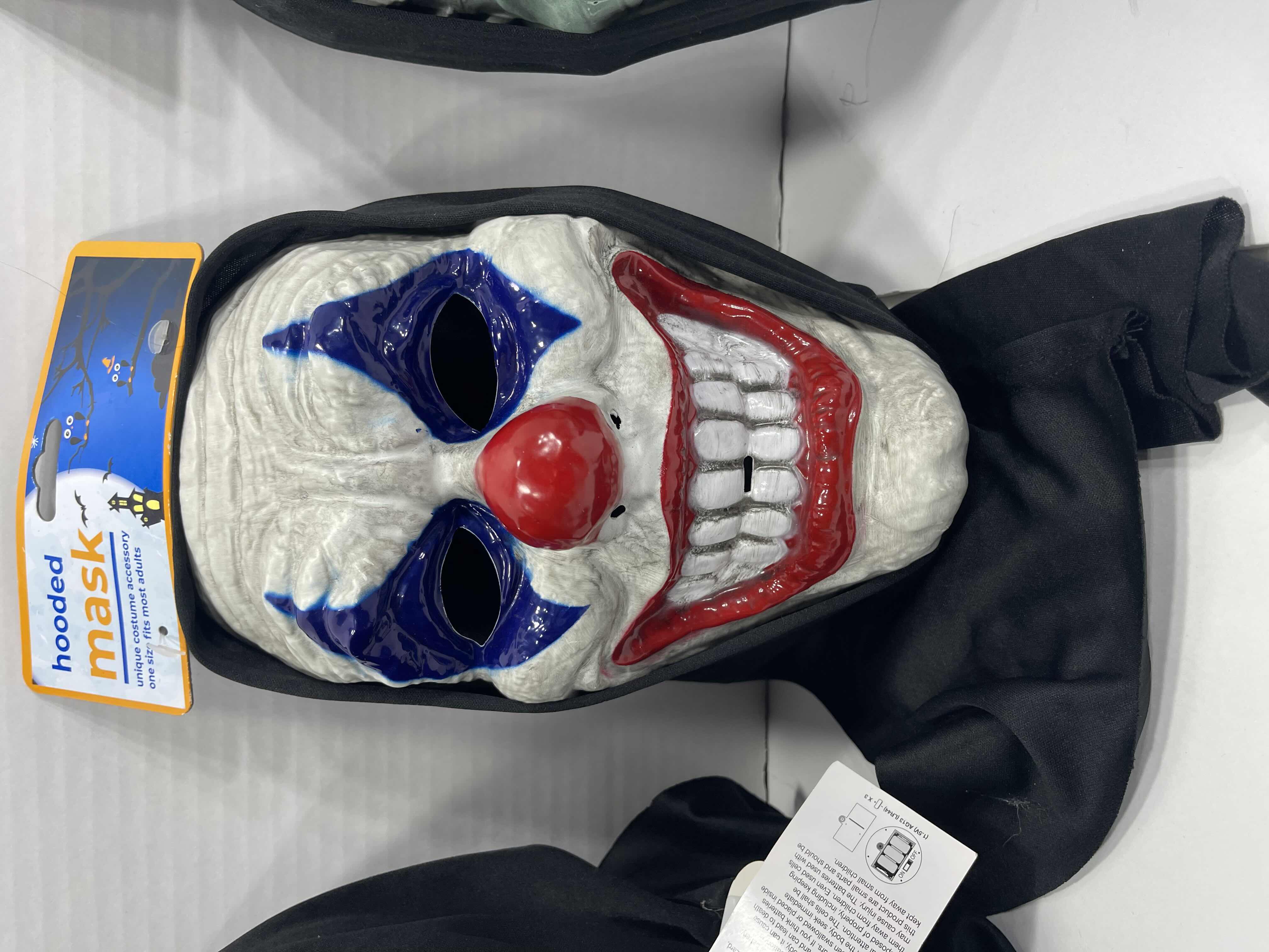 Photo 1 of ADULT ONE SIZE FITS MOST HALLOWEEN PLASTIC HOODED MASKS (3) - TWO MASKS WITH LIGHT UP EYES MSRP $60
