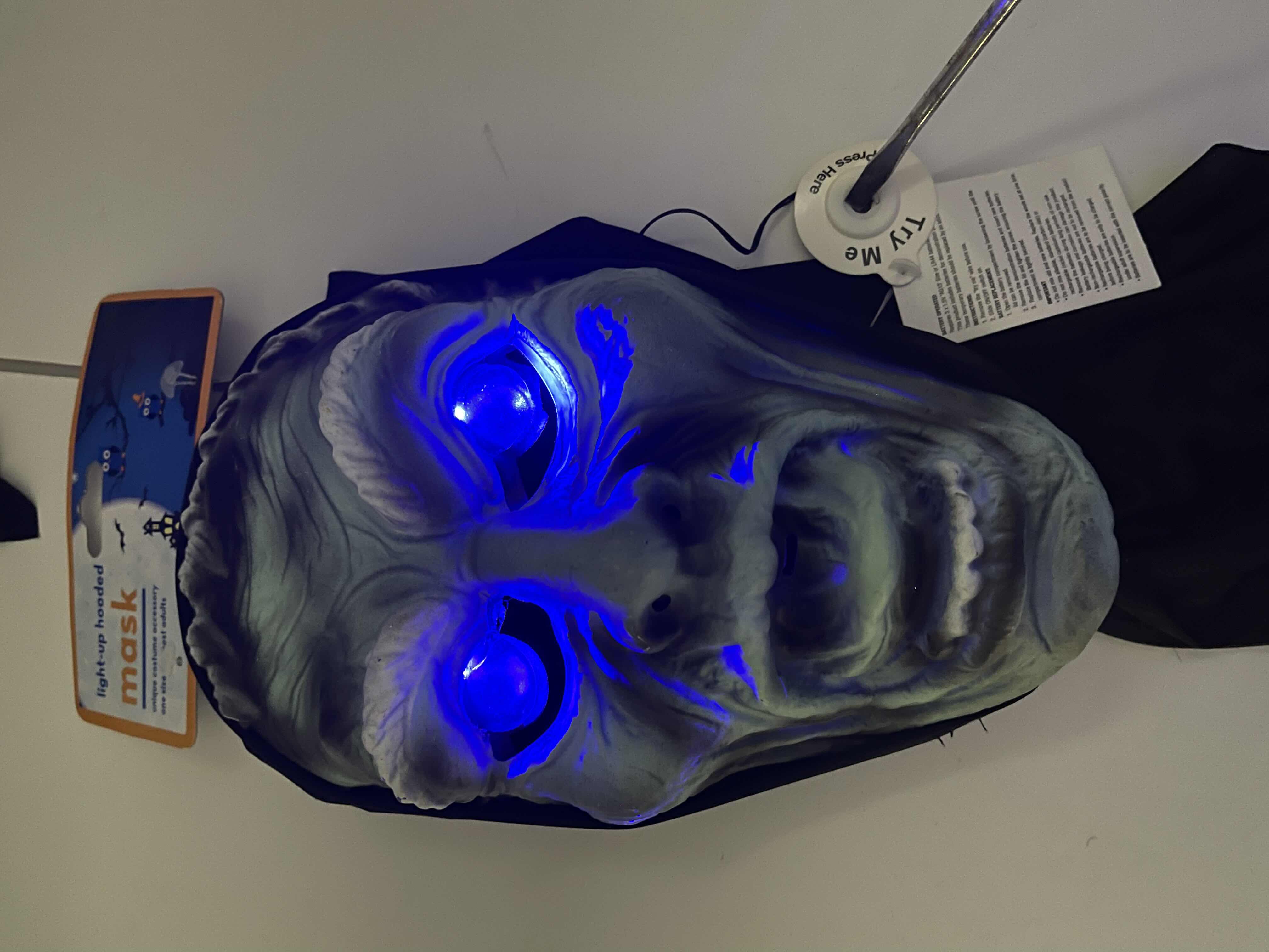 Photo 1 of ADULT ONE SIZE FITS MOST HALLOWEEN PLASTIC HOODED MASKS (3) - TWO MASKS WITH LIGHT UP EYES MSRP $60