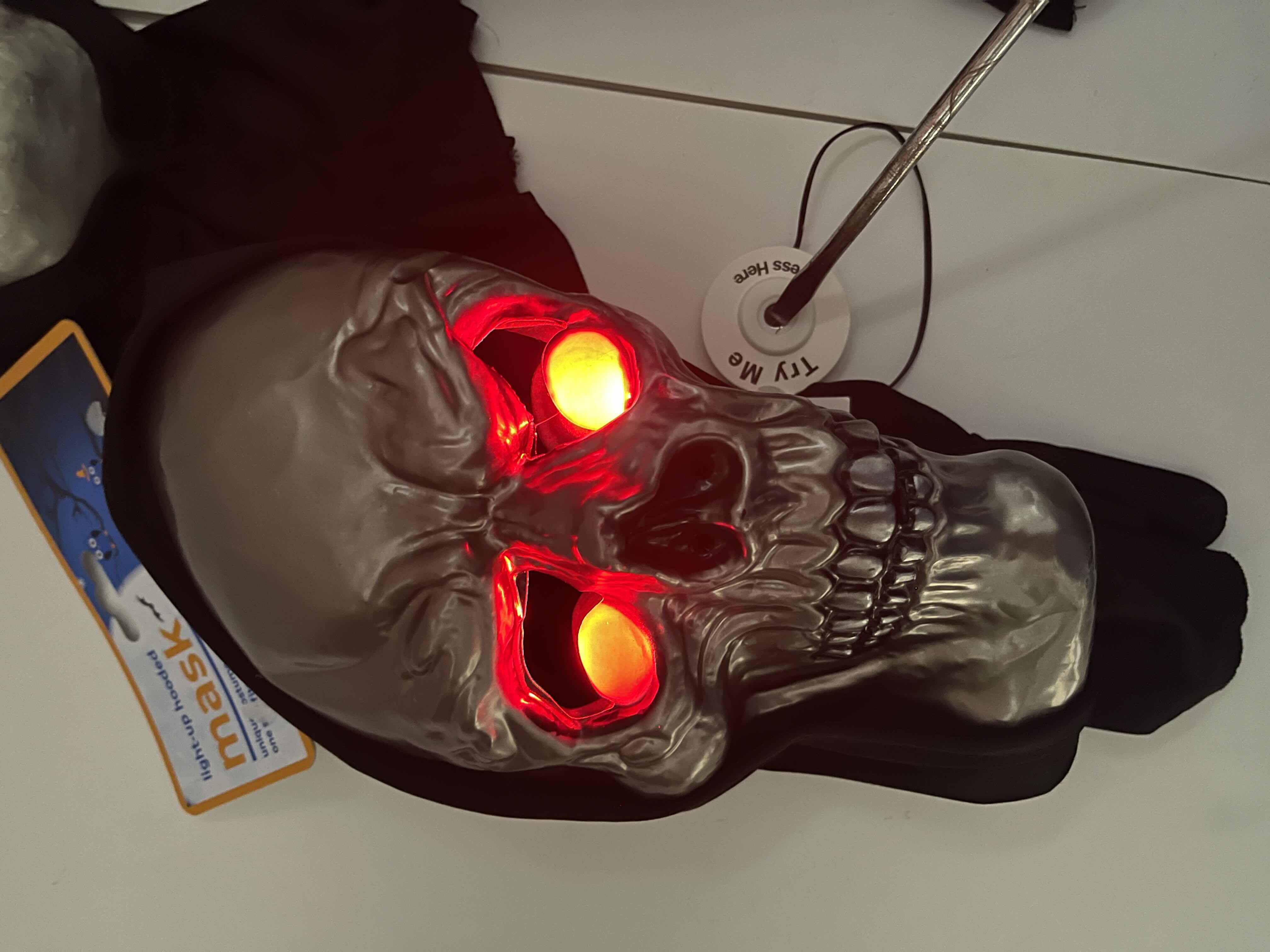 Photo 1 of ADULT ONE SIZE FITS MOST HALLOWEEN PLASTIC HOODED MASKS (3) - TWO MASKS WITH LIGHT UP EYES MSRP $60