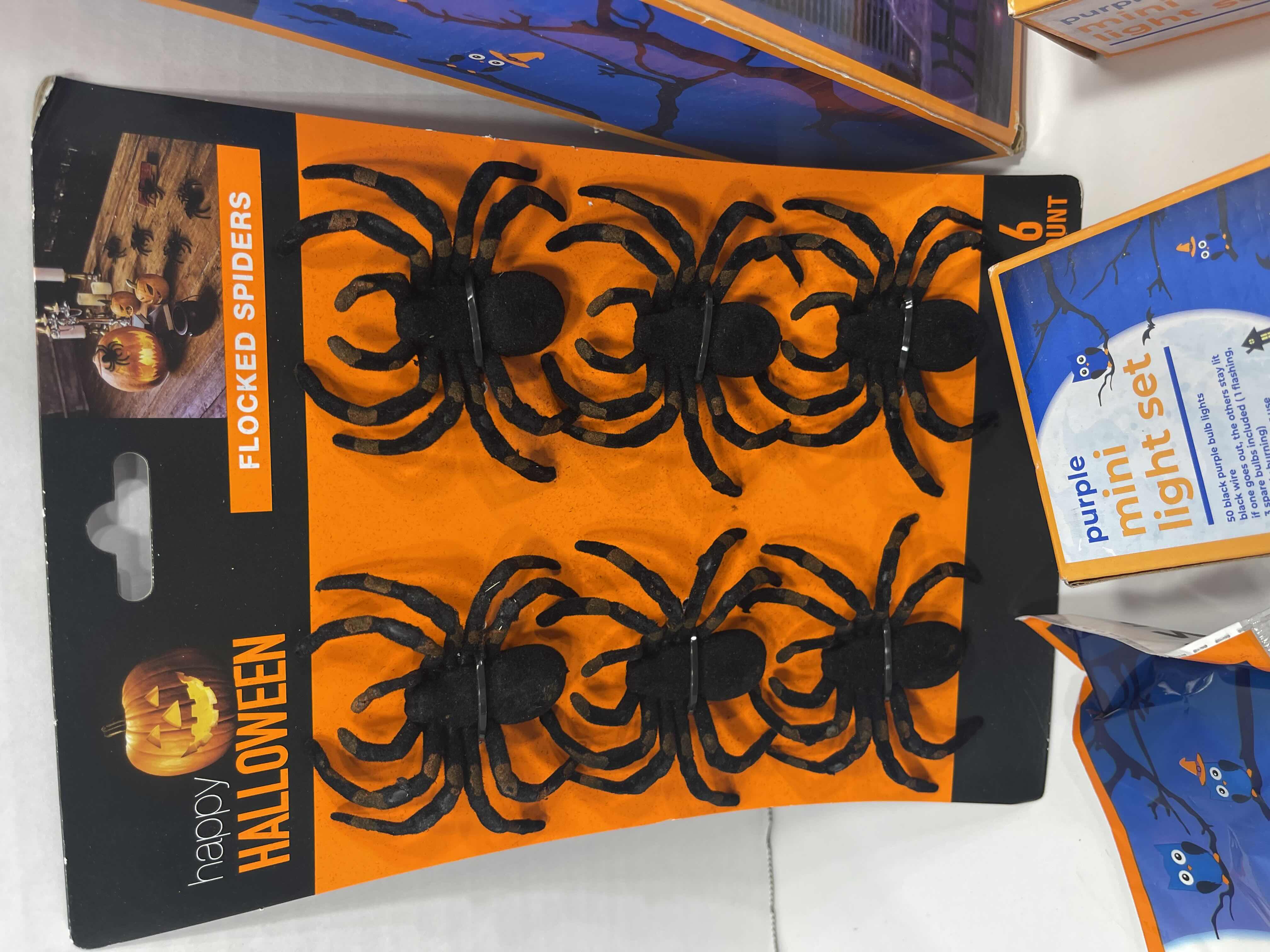 Photo 1 of SPIDER WEB PURPLE LIGHT SET, STRING LIGHTS, WEBBING & FLOCKED SPIDER SET MSRP $65