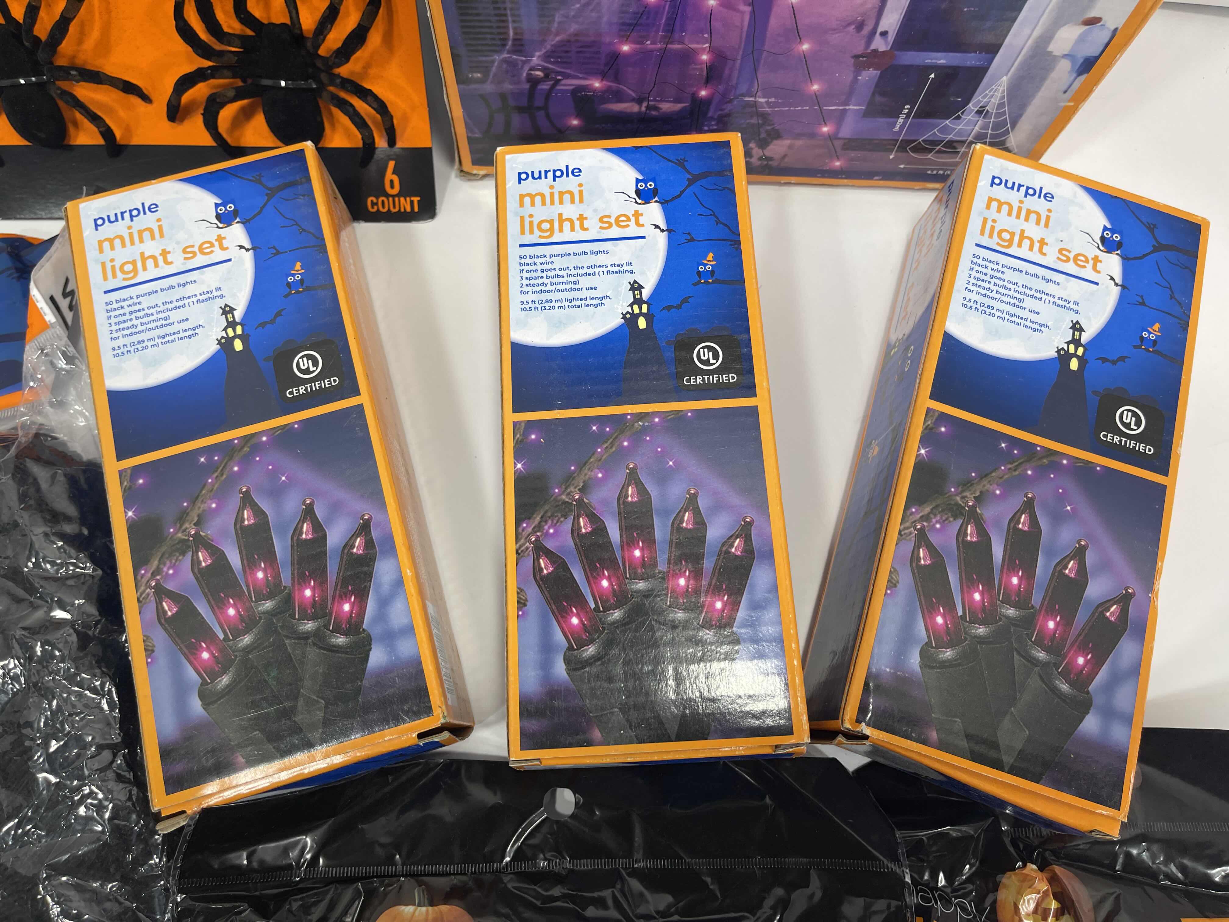 Photo 1 of SPIDER WEB PURPLE LIGHT SET, STRING LIGHTS, WEBBING & FLOCKED SPIDER SET MSRP $65