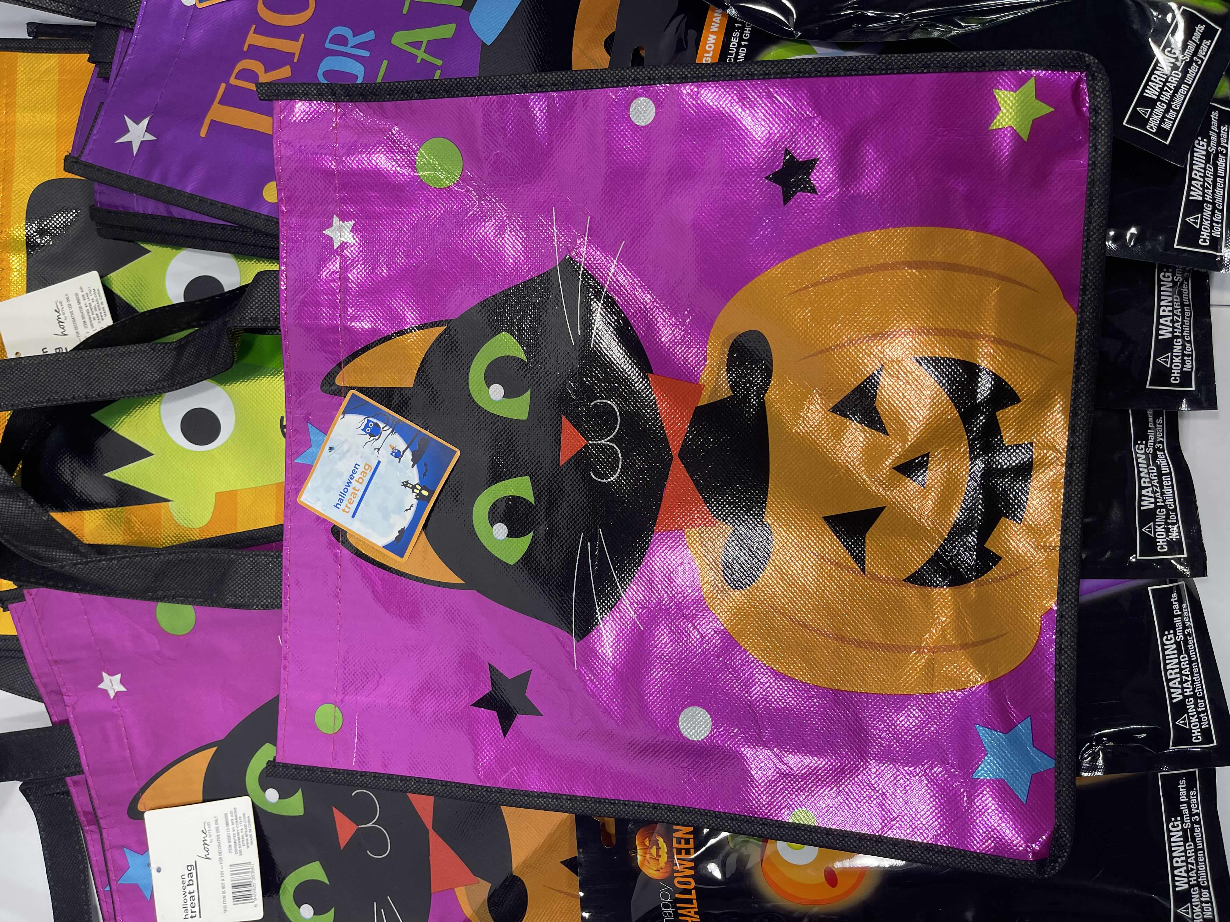 Photo 1 of HALLOWEEN TREAT BAGS 13” (3) OF EACH STYLE - 9 TOTAL AND GLOW WANDS (9) MSRP $60