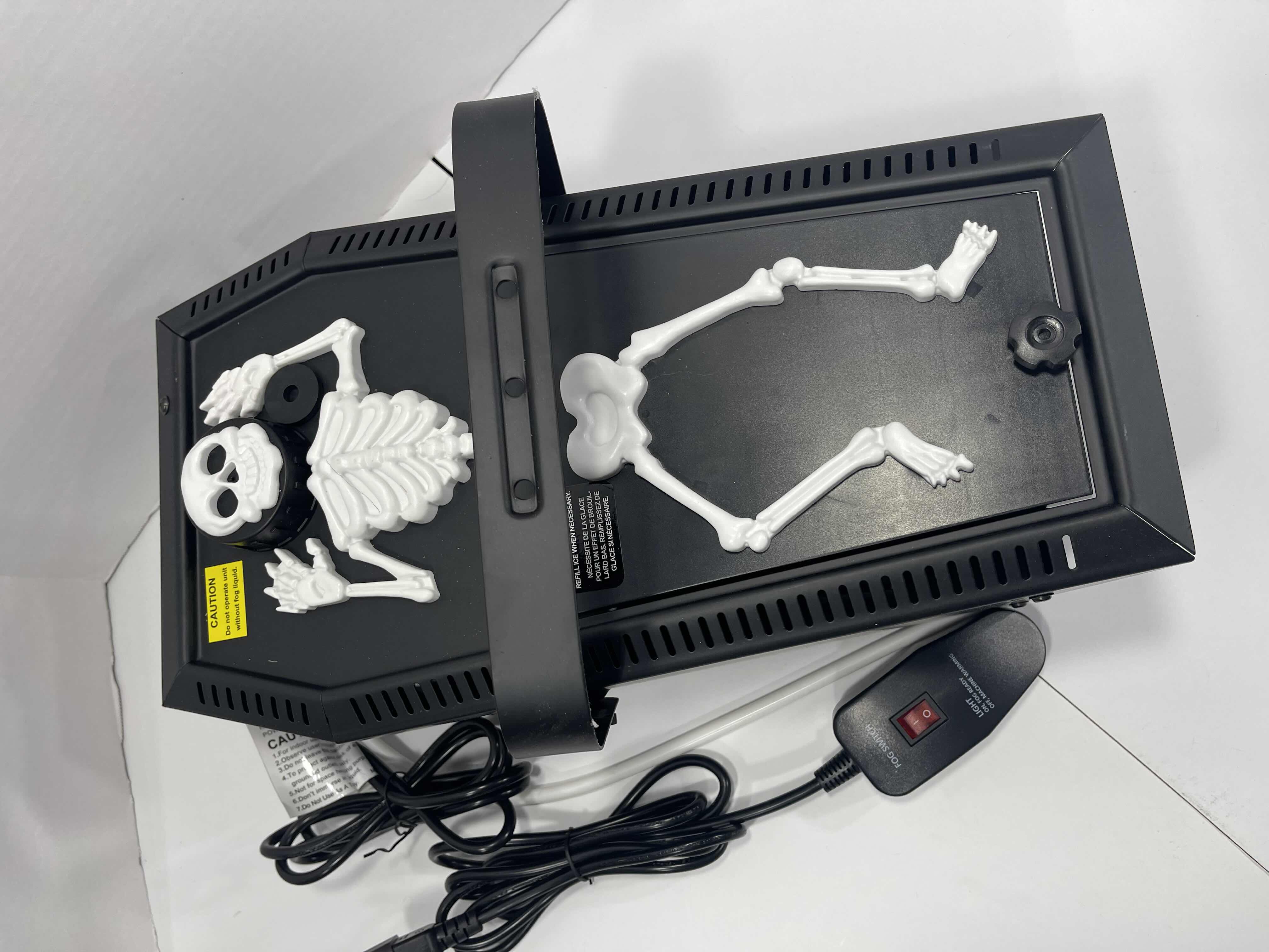 Photo 1 of HOME ACCENTS SKELETON CASKET GROUND FOGGER 400 WATT