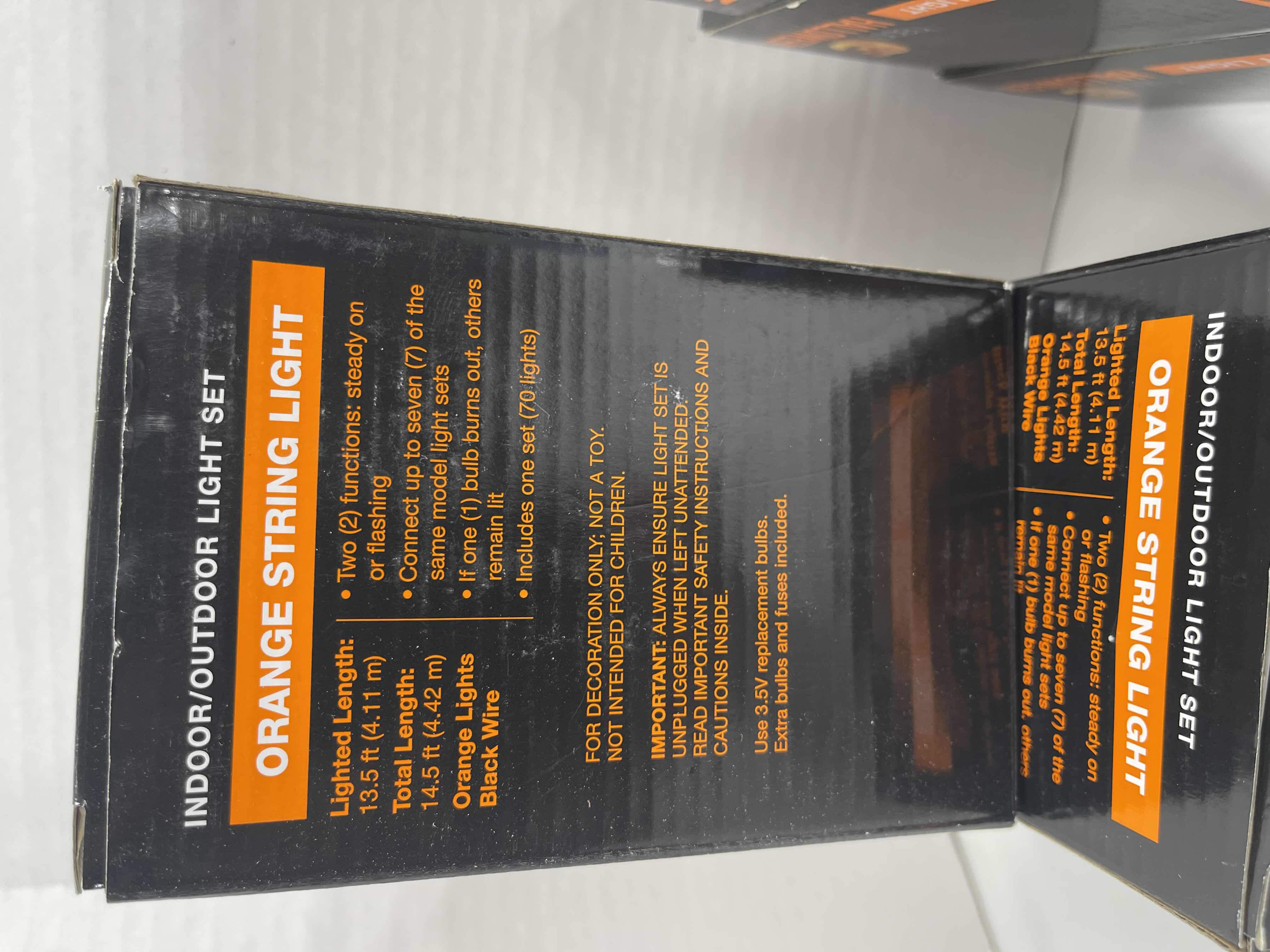 Photo 1 of HAPPY HALLOWEEN LIGHT SETS NEW - ORANGE INDOOR/OUTDOOR STRING LIGHT SET 70 LIGHTS (6) & INDOOR LED GHOST LIGHT SET 10 LIGHTS (3) MSRP $60