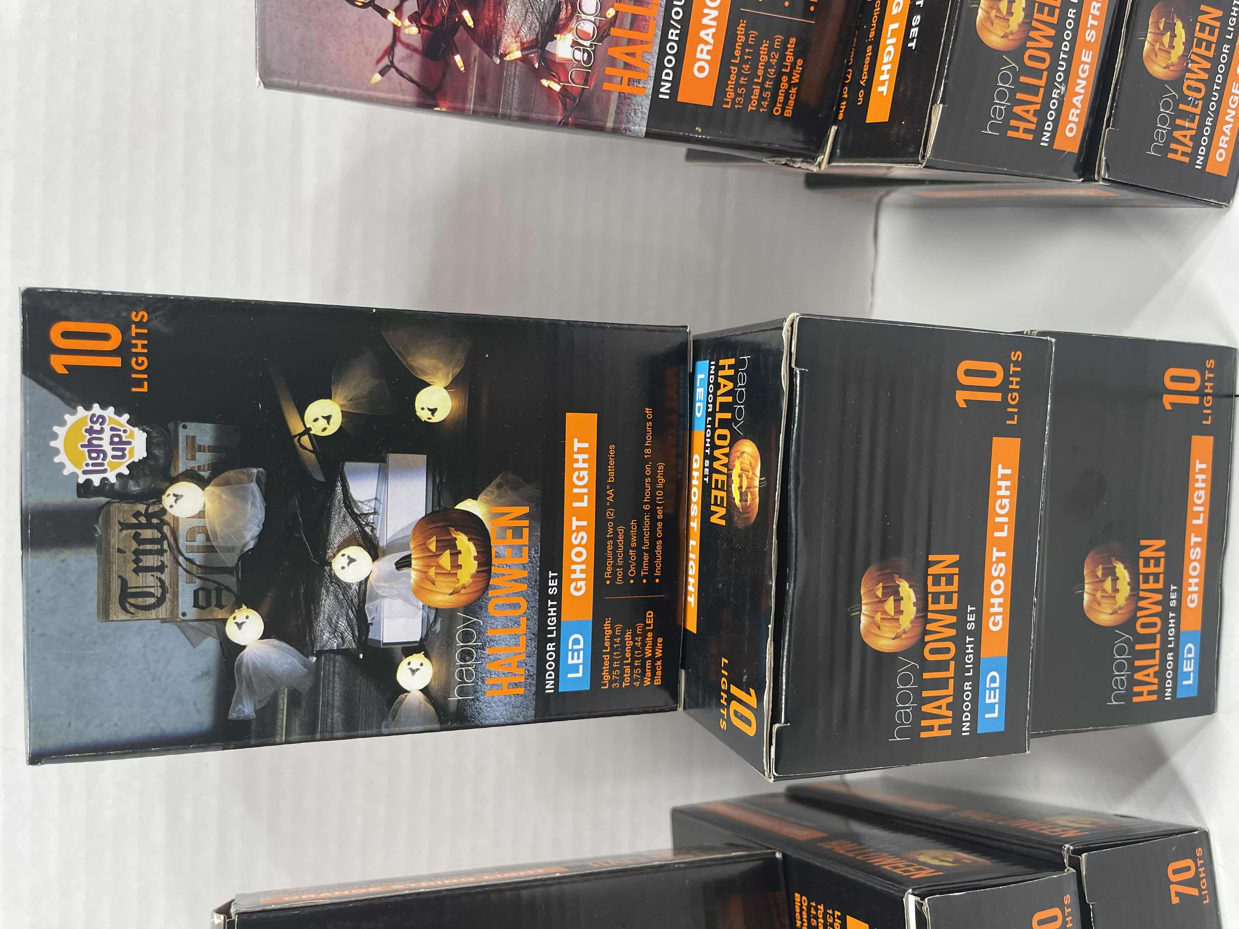 Photo 1 of HAPPY HALLOWEEN LIGHT SETS NEW - ORANGE INDOOR/OUTDOOR STRING LIGHT SET 70 LIGHTS (6) & INDOOR LED GHOST LIGHT SET 10 LIGHTS (3) MSRP $60