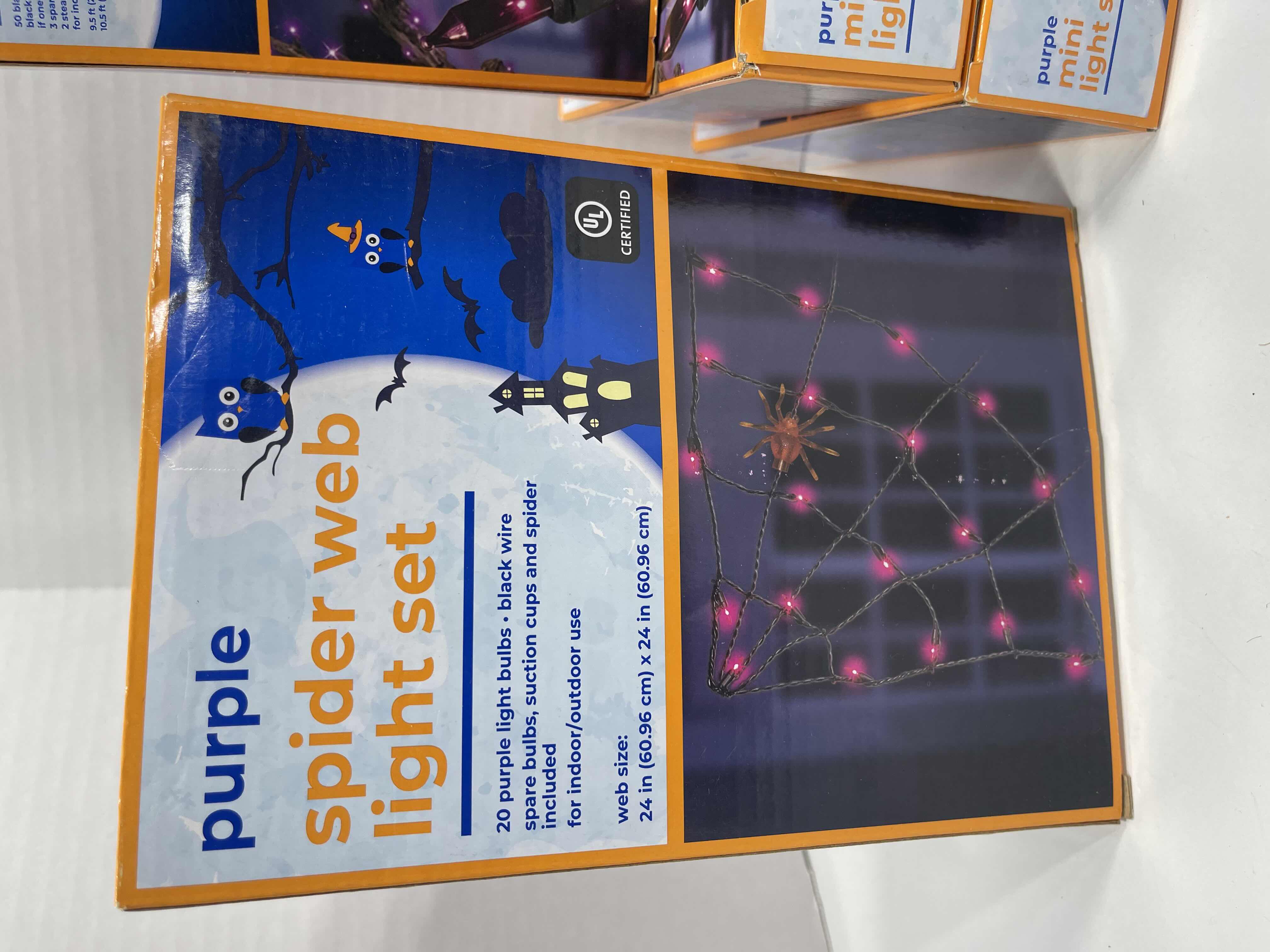 Photo 1 of SPIDER WEB LIGHT SET (2) PURPLE & ORANGE COLOR, PURPLE MINI STRING LIGHT SET (3) AND ORANGE MINI STRING LIGHT SET (3) MSRP $75