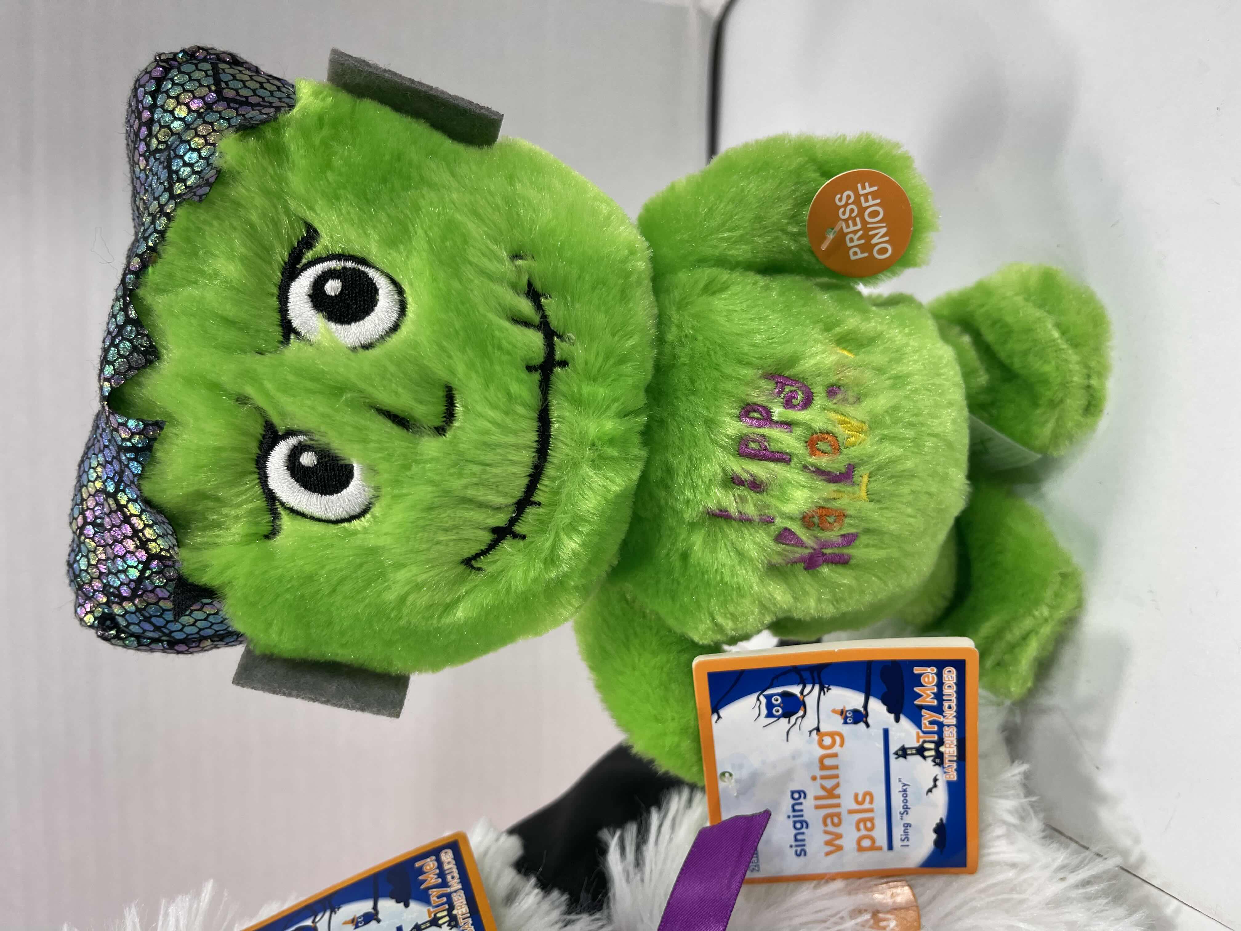 Photo 1 of HOME BRAND HALLOWEEN ANIMATED SINGING WALKING PALS 8.5” (2) & SINGING SPINNING PUPPY 9” MSRP $45