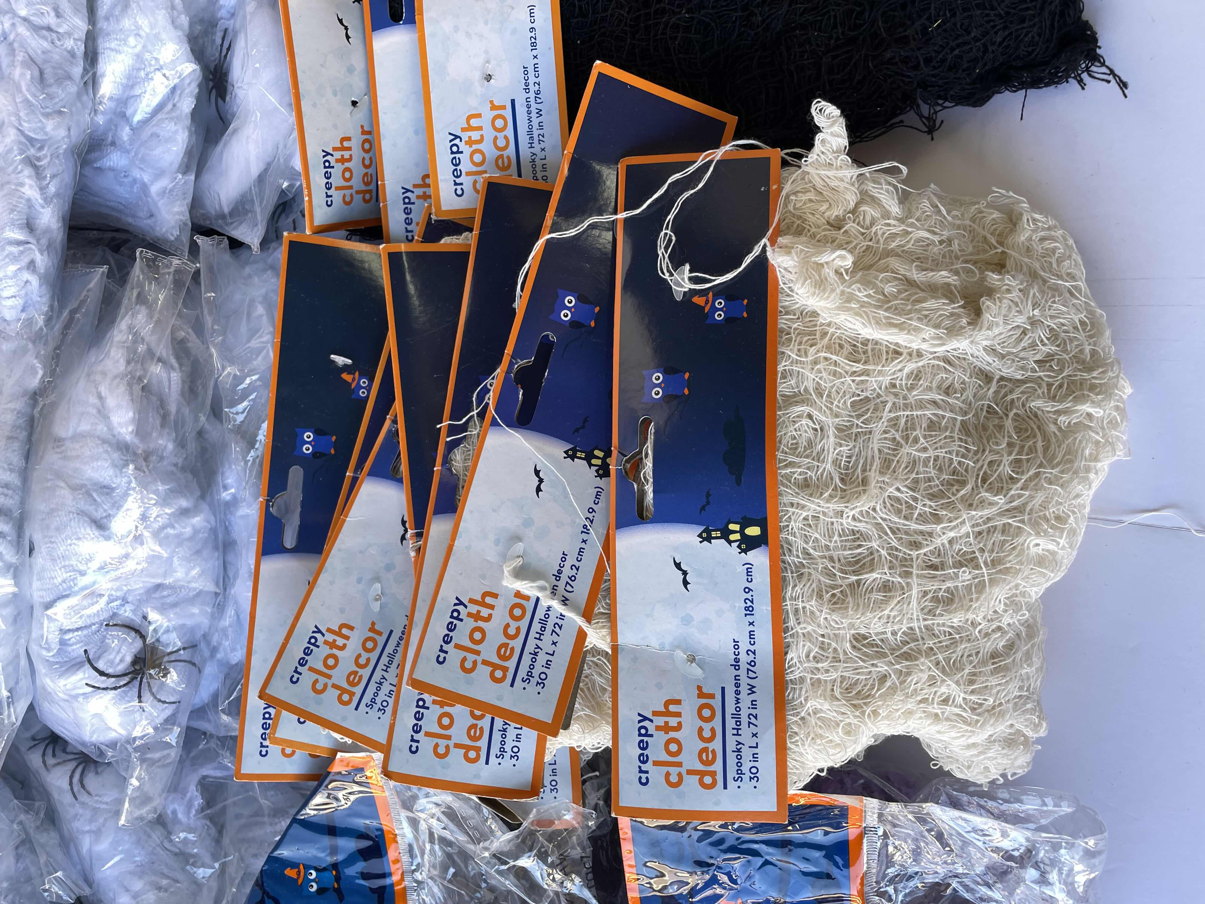 Photo 1 of HALLOWEEN SPIDER WEBS AND CREEPY CLOTHS DECOR LOT (33 ITEMS) MSRP $99