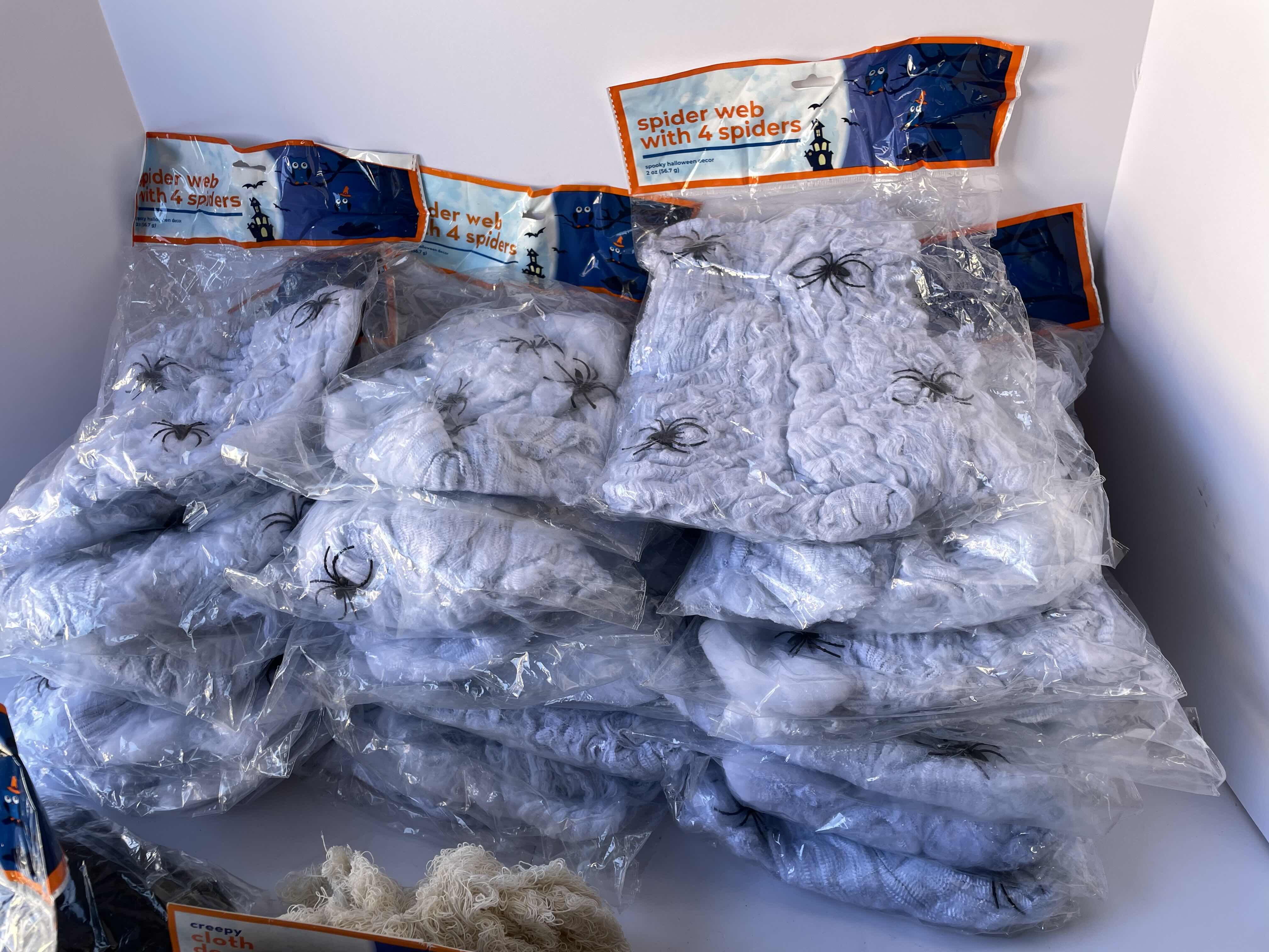 Photo 1 of HALLOWEEN SPIDER WEBS AND CREEPY CLOTHS DECOR LOT (33 ITEMS) MSRP $99