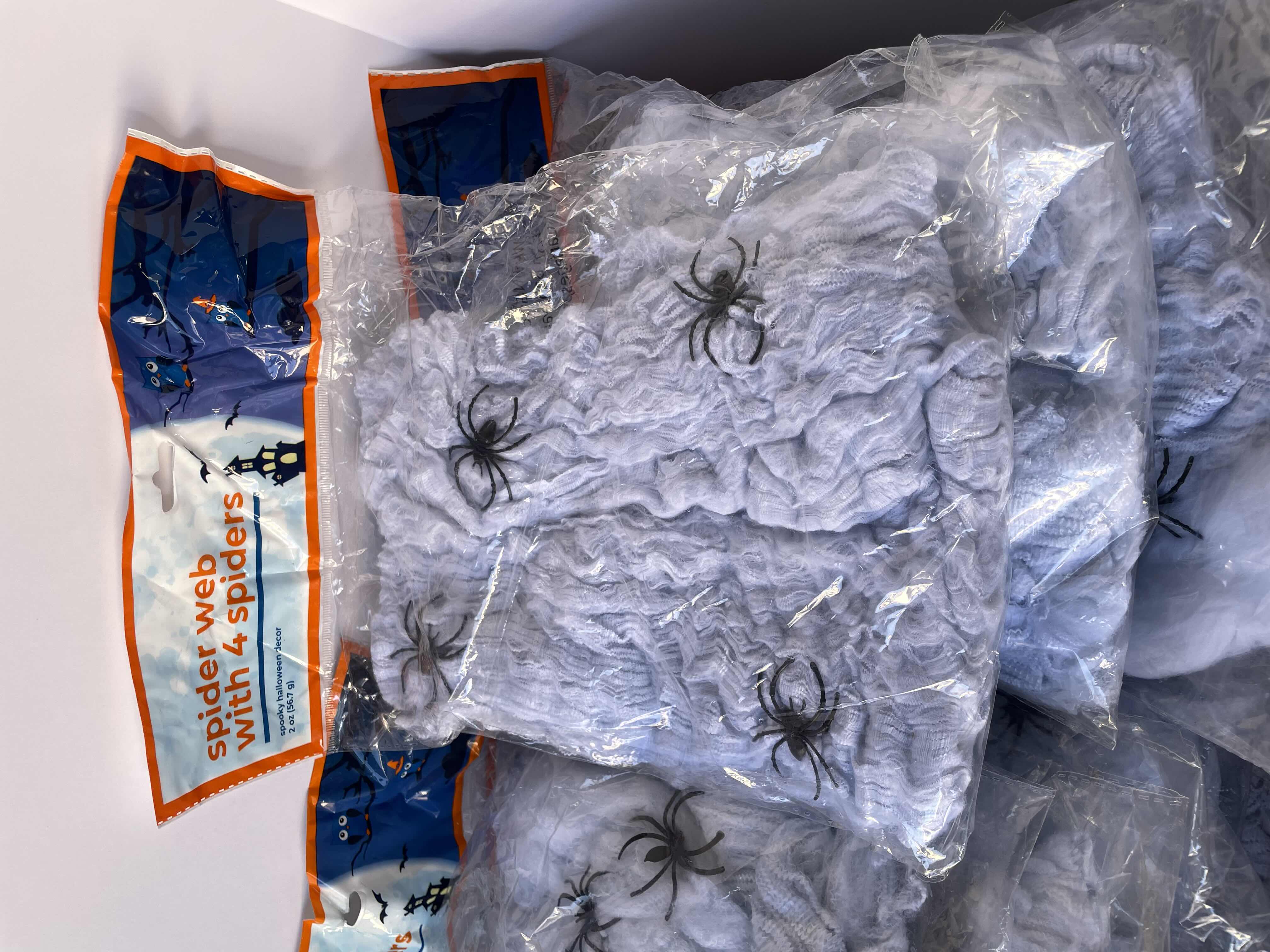 Photo 1 of HALLOWEEN SPIDER WEBS AND CREEPY CLOTHS DECOR LOT (33 ITEMS) MSRP $99