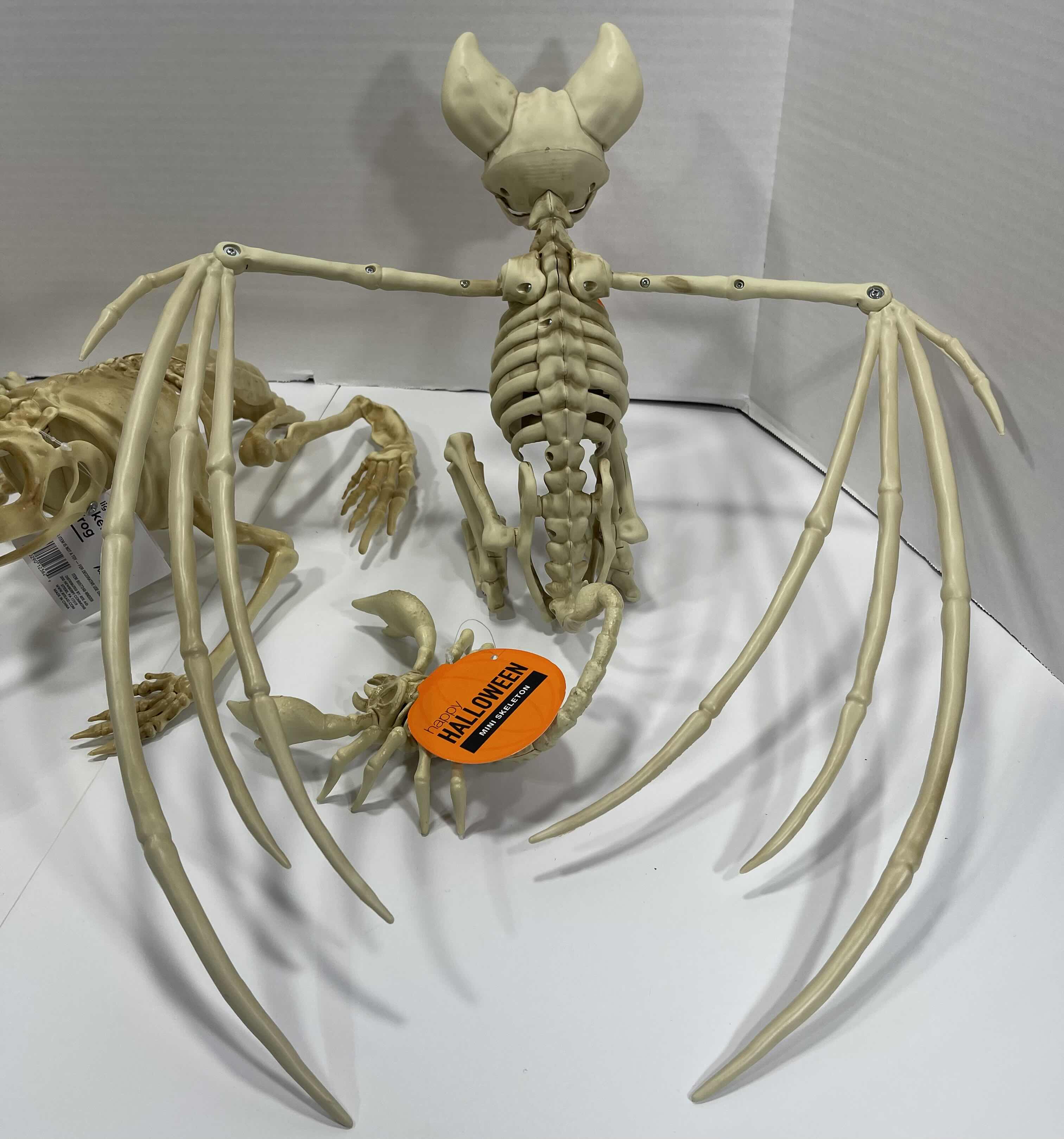Photo 1 of HALLOWEEN FROG SKELETON LIGHT-UP, BAT SKELETON, MINI SKELETONS YARD/HOME DECORATIONS (7 ITEMS) MSRP $80