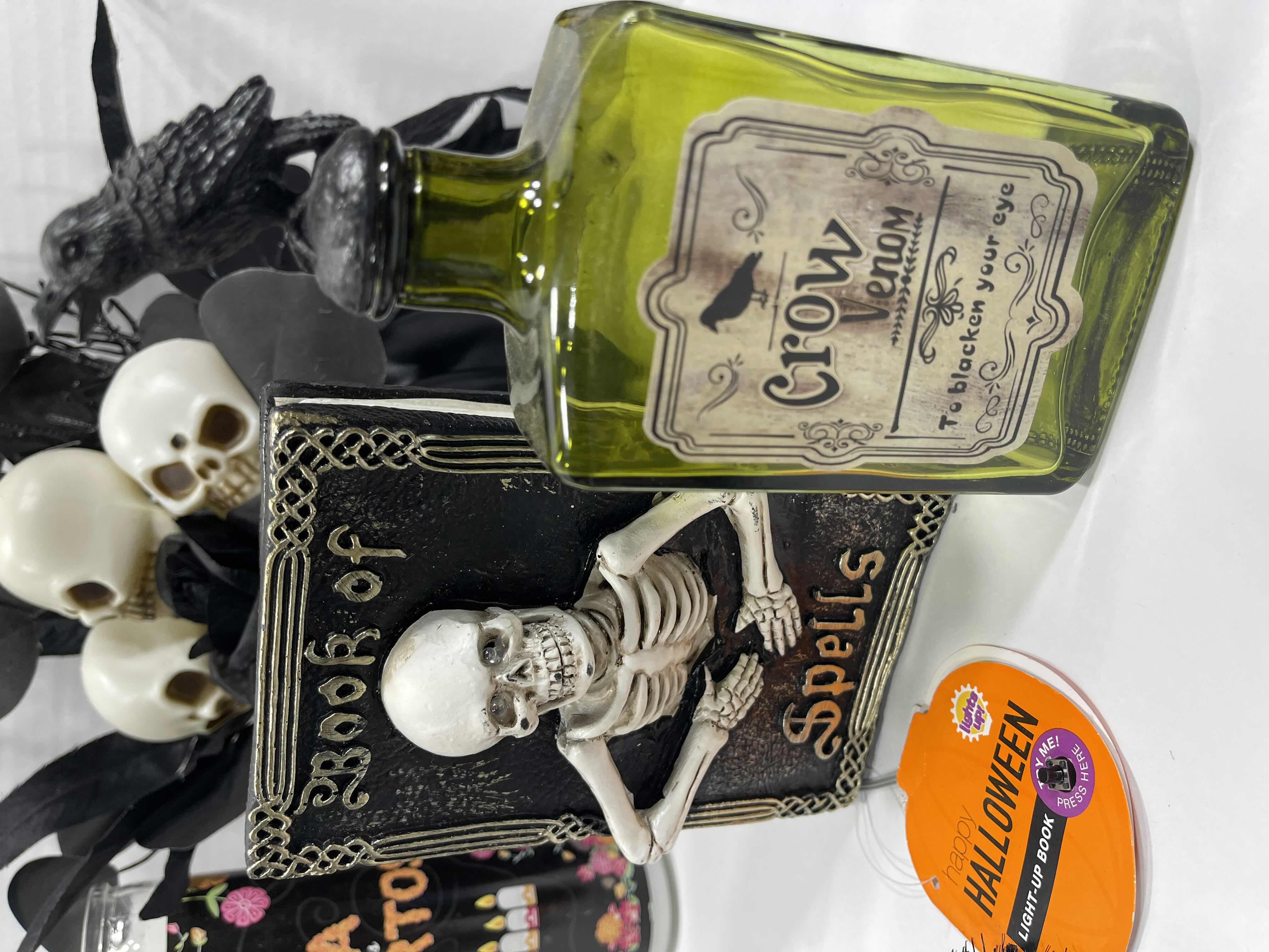 Photo 1 of HALLOWEEN TABLE TOP DECOR LARGE ASSORTMENT, CANDLES, BLACK LIGHT BULBS & LED COFFIN WIRE SETS MSRP $60