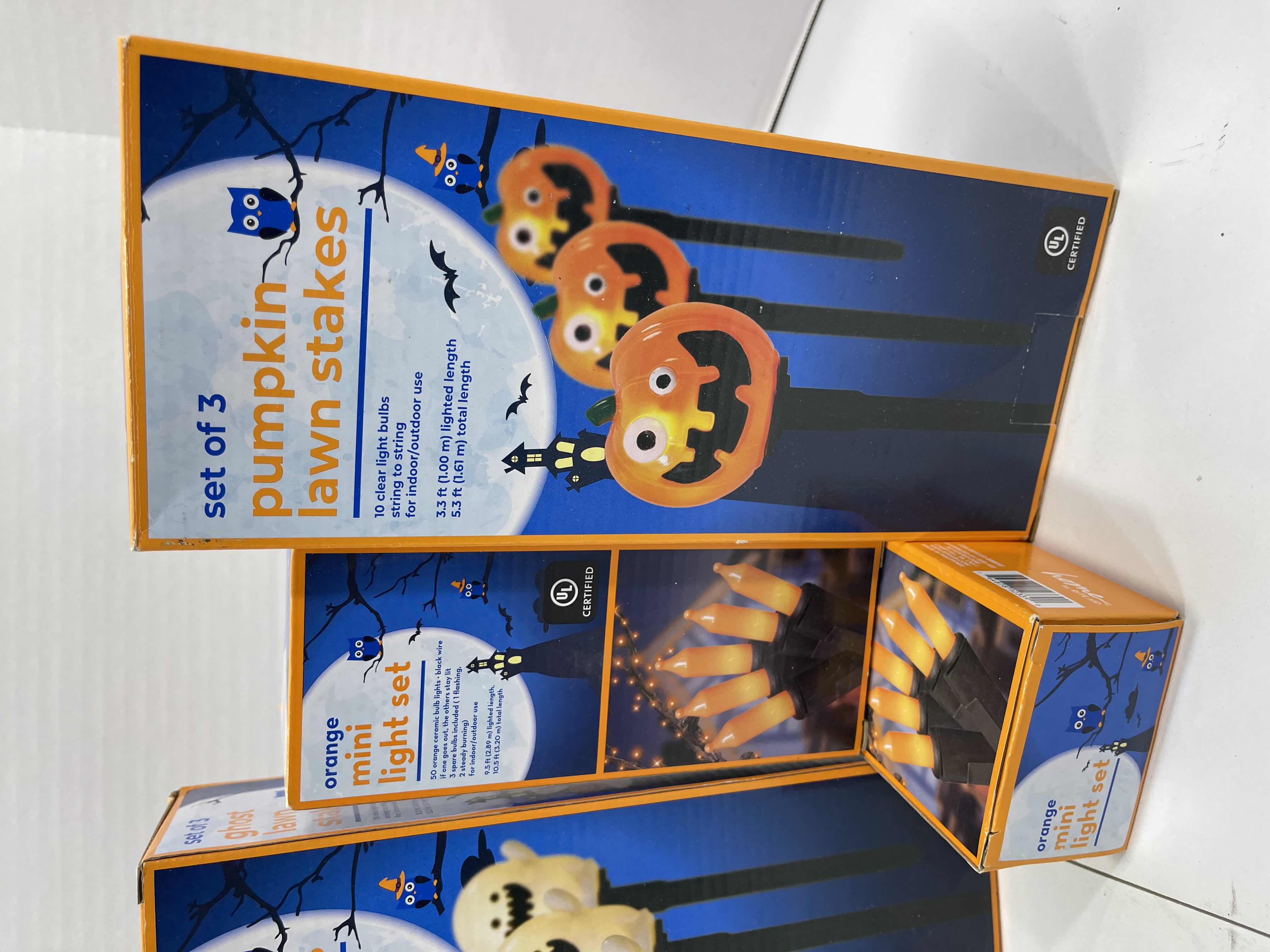 Photo 1 of HALLOWEEN INDOOR/OUTDOOR LIGHT SETS (6), CANDY CORN LIGHT SET (2), LIGHTED LAWN STAKES (3) & SPIDER WEBS WITH SPIDERS (3 BAGS) MSRP $75