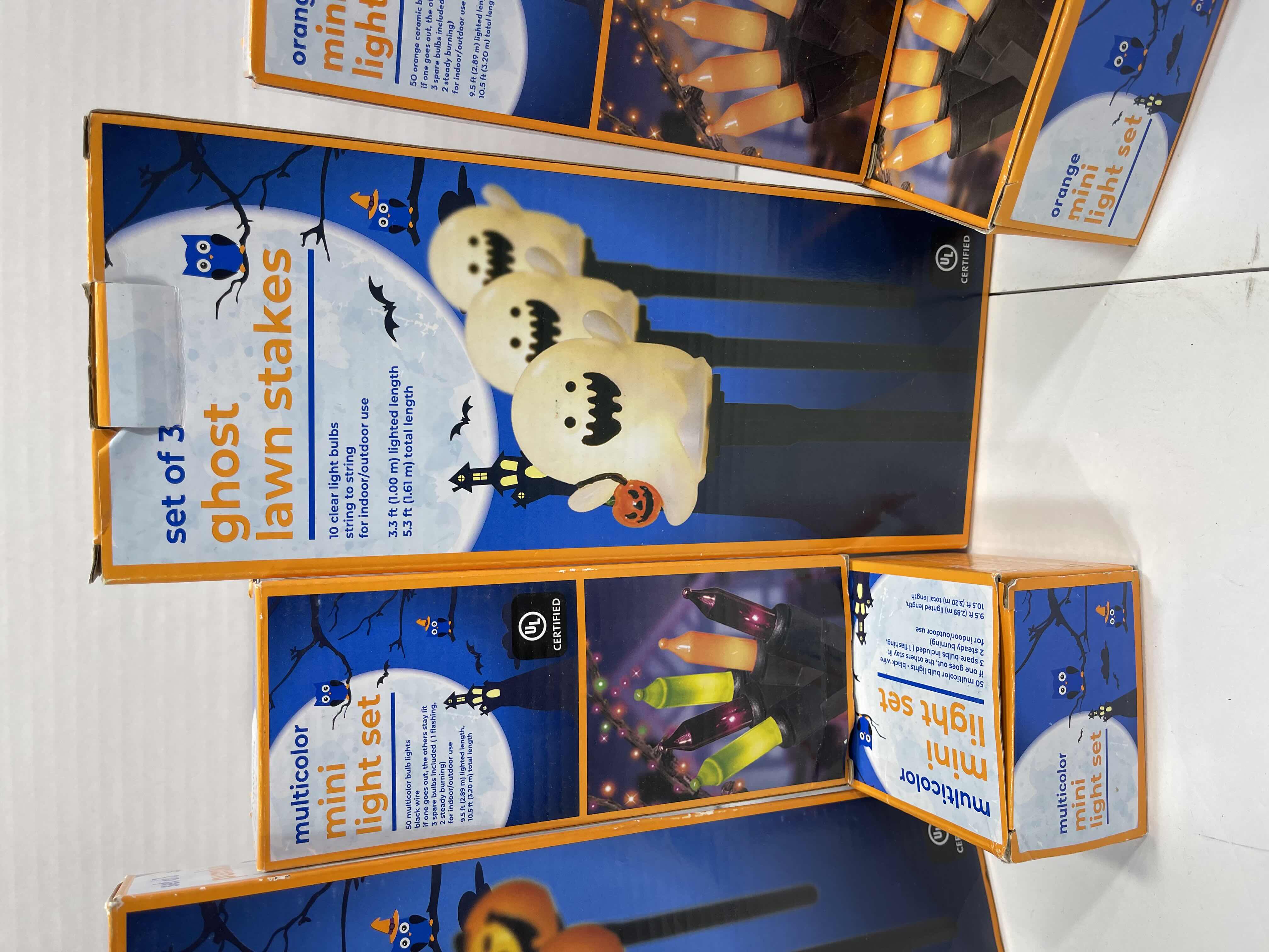 Photo 1 of HALLOWEEN INDOOR/OUTDOOR LIGHT SETS (6), CANDY CORN LIGHT SET (2), LIGHTED LAWN STAKES (3) & SPIDER WEBS WITH SPIDERS (3 BAGS) MSRP $75