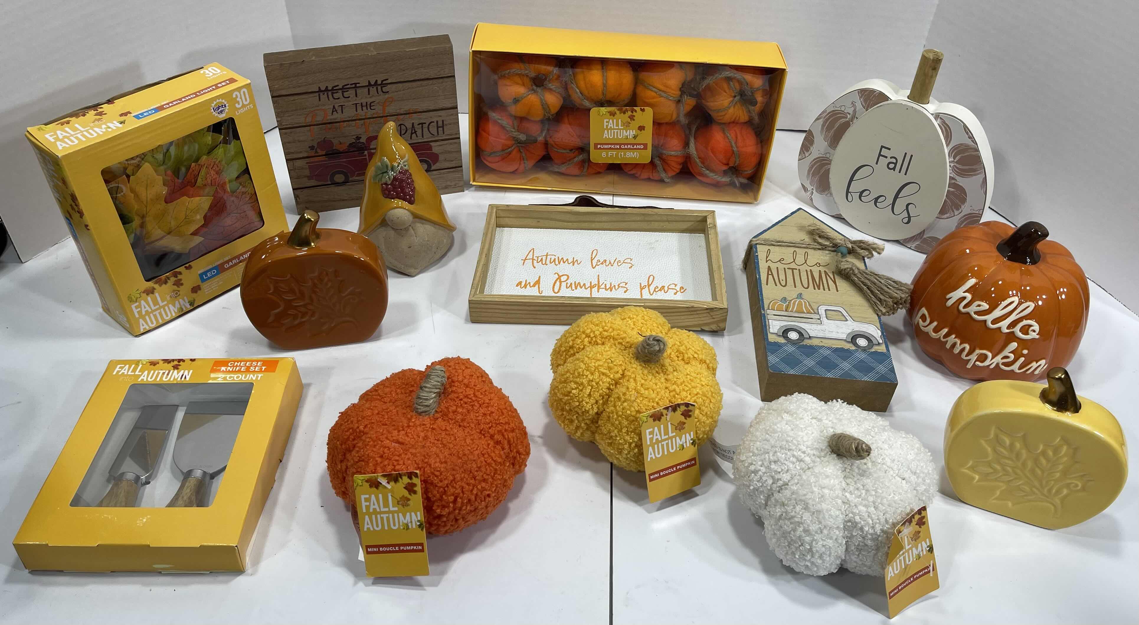 Photo 1 of FALL AUTUMN HOME DECOR (14 ITEMS) - WOOD SIGNS, LED LIGHTS, GARLAND, MINI BOUCLE PUMPKINS, CHEESE KNIFE SET & CERAMIC GNOME AND PUMPKINS MSRP $100
