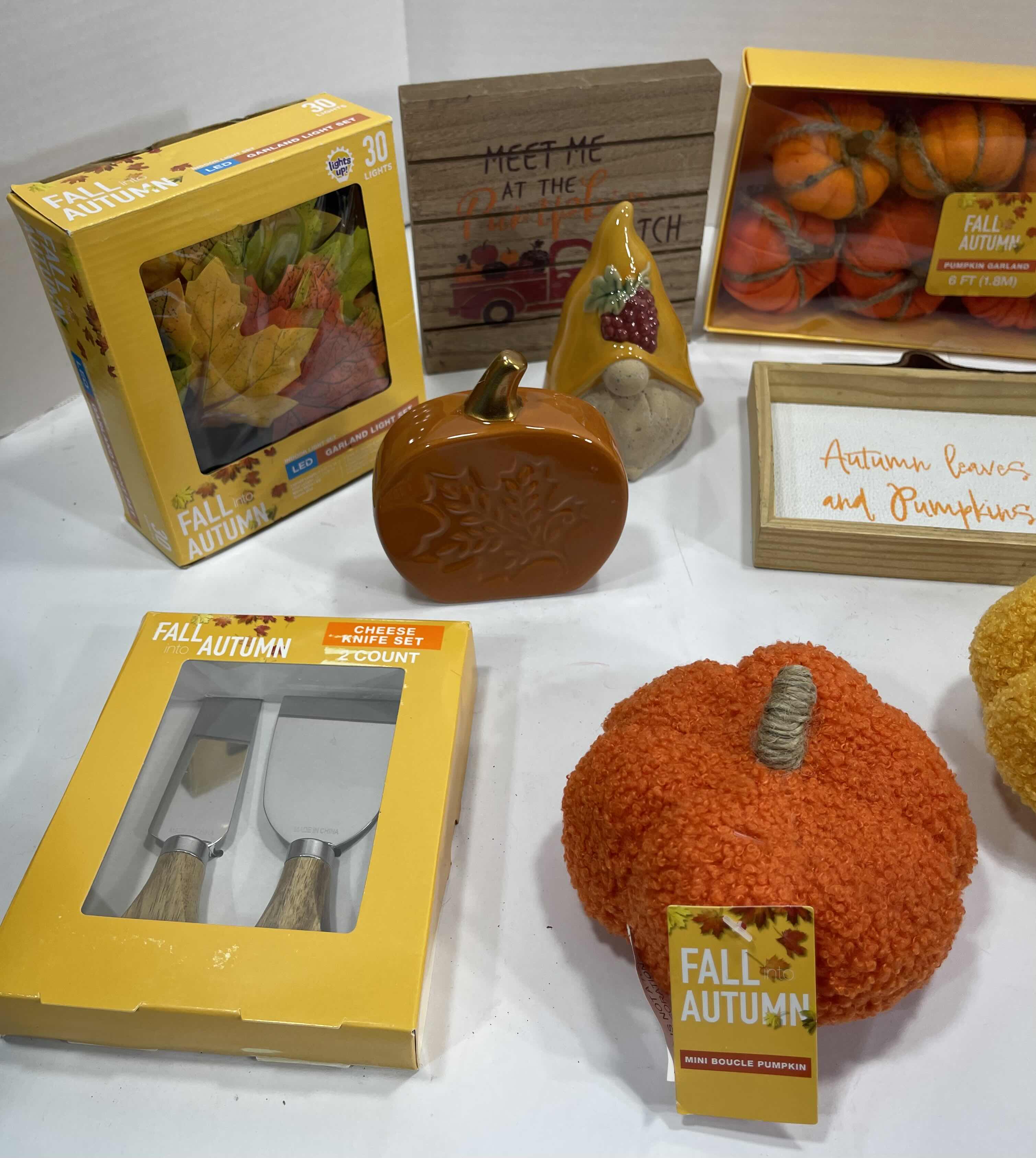 Photo 1 of FALL AUTUMN HOME DECOR (14 ITEMS) - WOOD SIGNS, LED LIGHTS, GARLAND, MINI BOUCLE PUMPKINS, CHEESE KNIFE SET & CERAMIC GNOME AND PUMPKINS MSRP $100