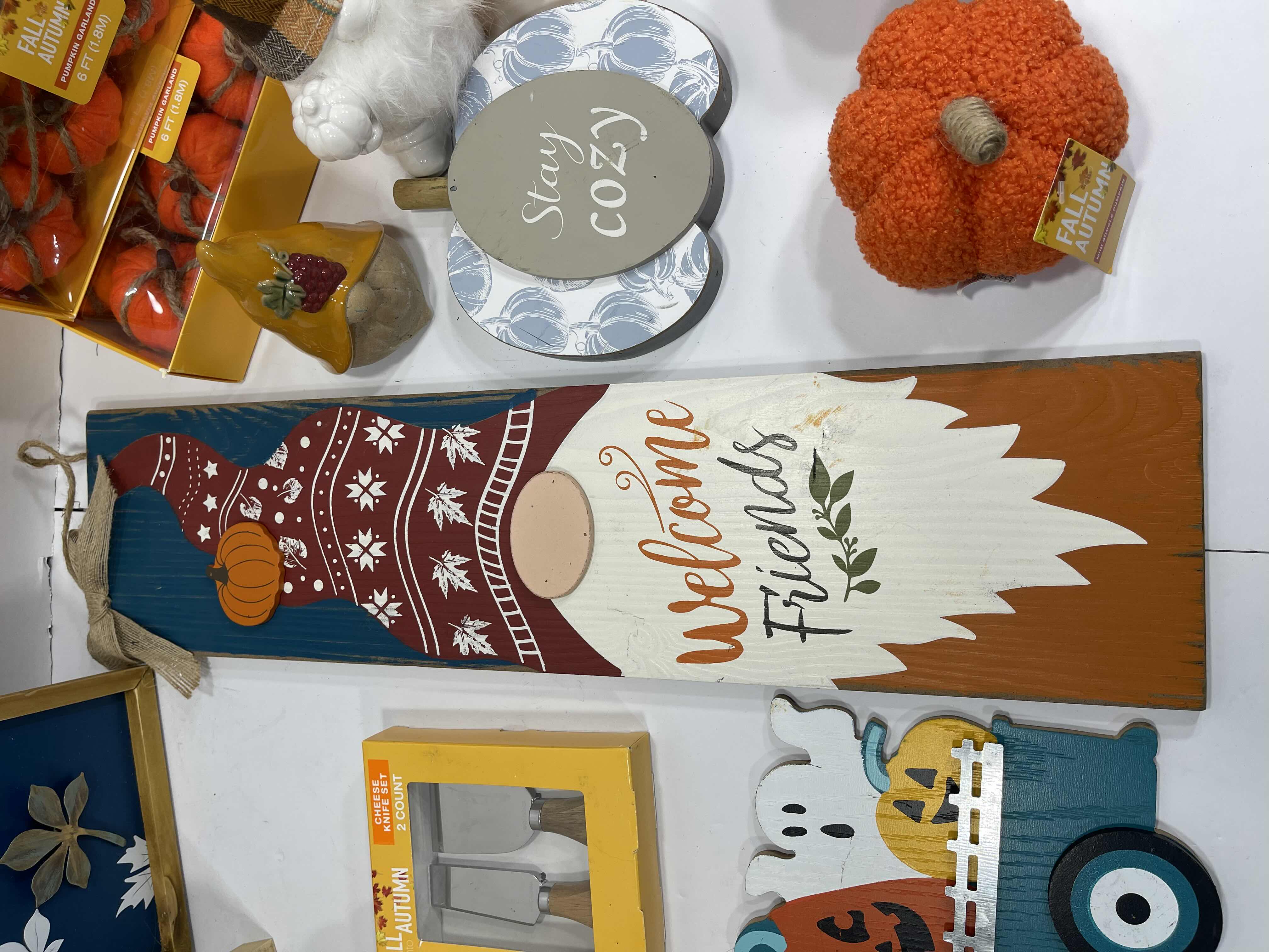 Photo 1 of FALL AUTUMN HOME DECOR (15 ITEMS) - WOOD SIGNS, GARLAND SETS, MINI BOUCLE PUMPKINS, CHEESE KNIFE SET & CERAMIC GNOMES, TRAVEL CUP AND PUMPKIN MSRP $100
