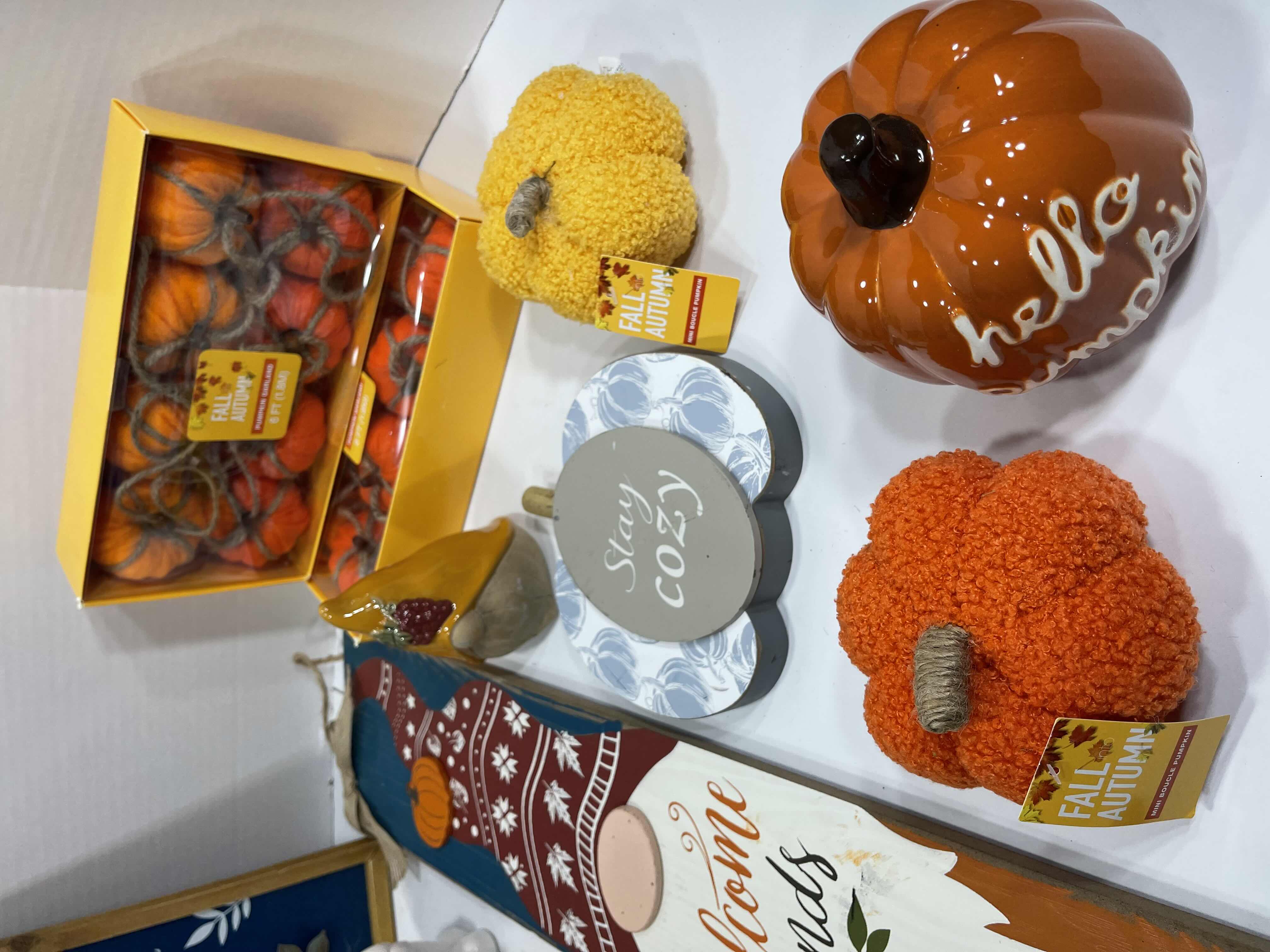 Photo 1 of FALL AUTUMN HOME DECOR (15 ITEMS) - WOOD SIGNS, GARLAND SETS, MINI BOUCLE PUMPKINS, CHEESE KNIFE SET & CERAMIC GNOMES, TRAVEL CUP AND PUMPKIN MSRP $100