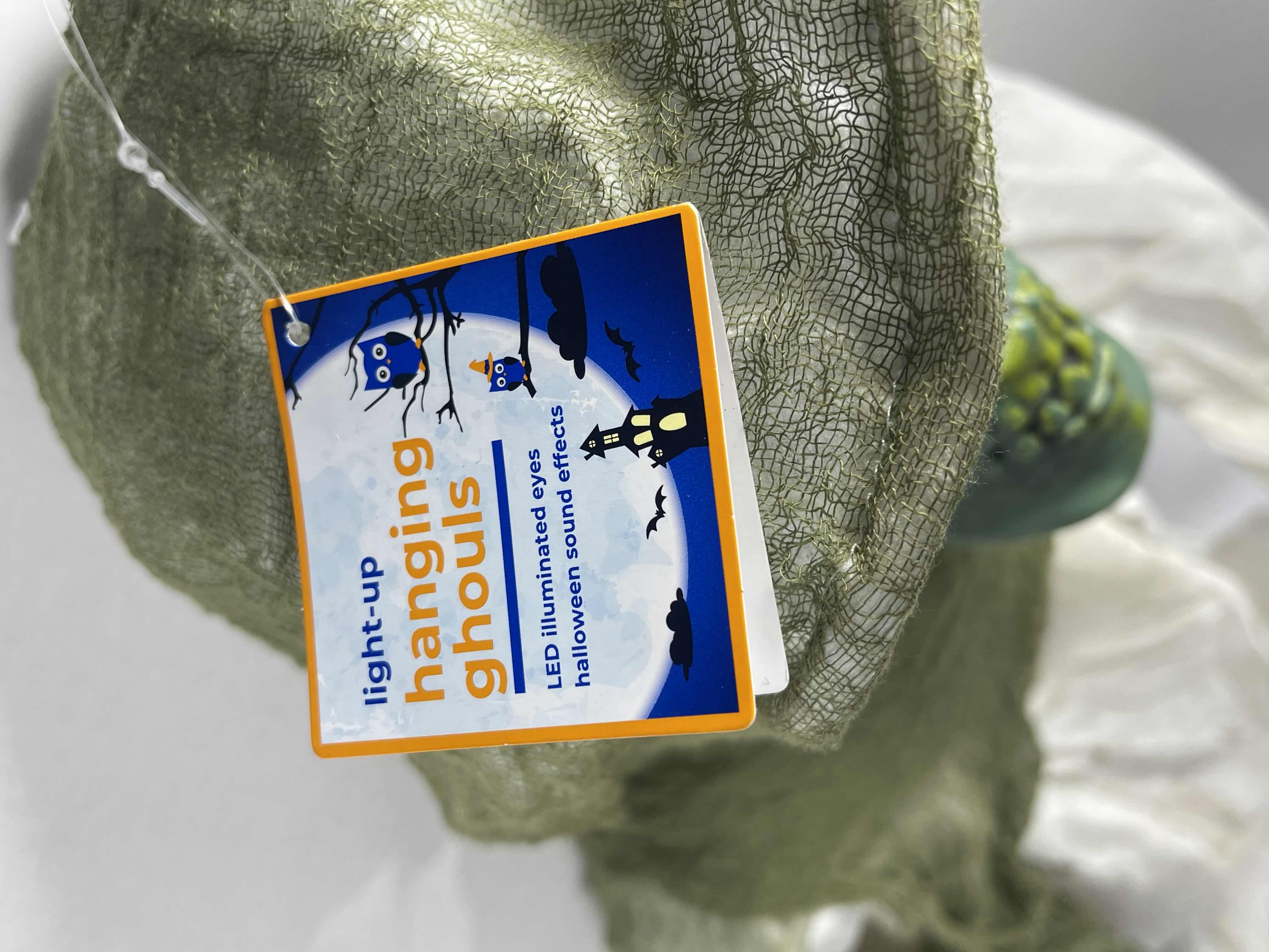 Photo 1 of LIGHT-UP HANGING GHOUL H40” LED ILLUMINATED EYES AND HALLOWEEN SOUND EFFECTS MSRP $50