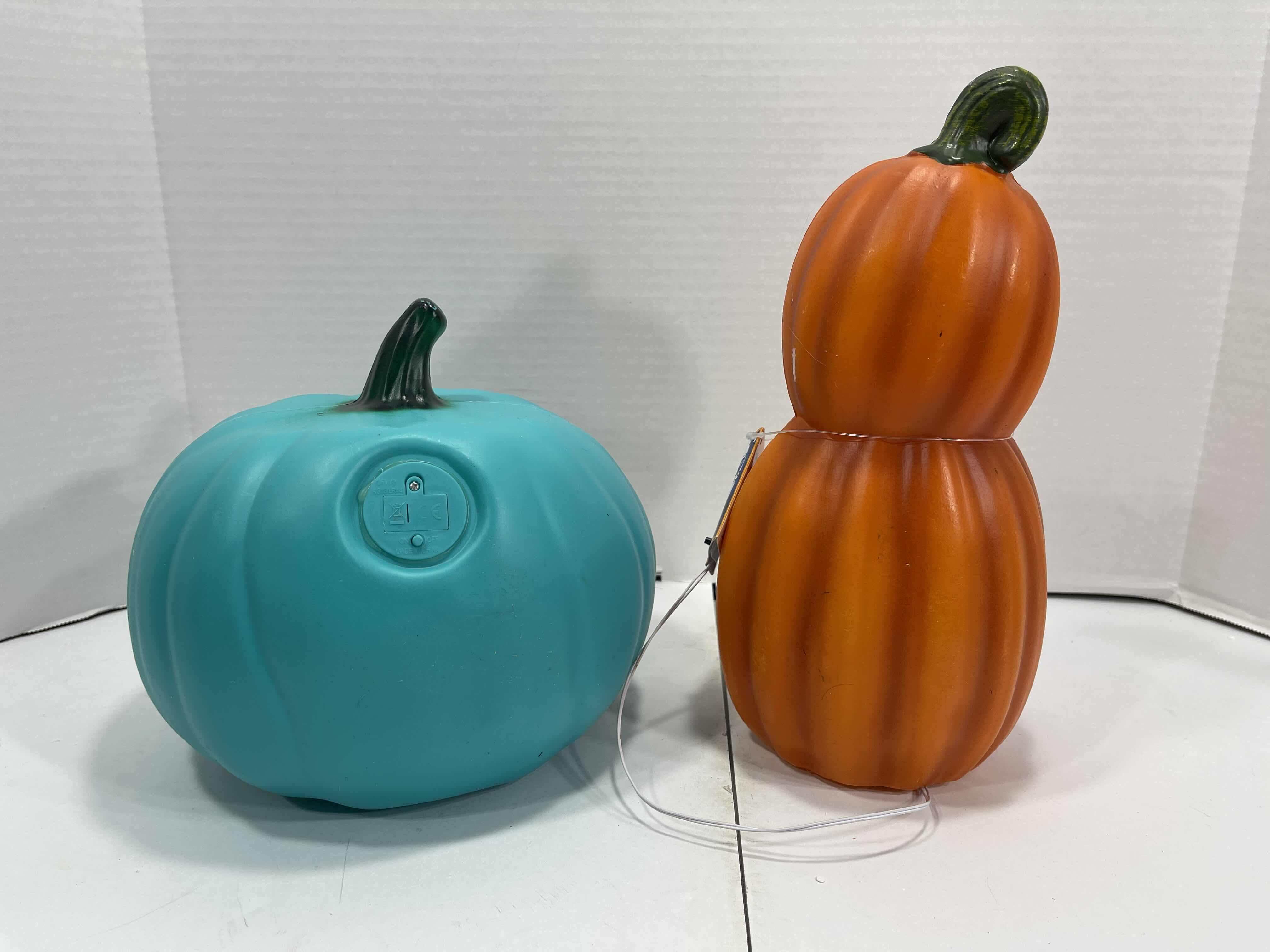 Photo 1 of HALLOWEEN HOME DECOR LIGHT-UP PLASTIC PUMPKINS (2) TALLEST 11” MSRP $25